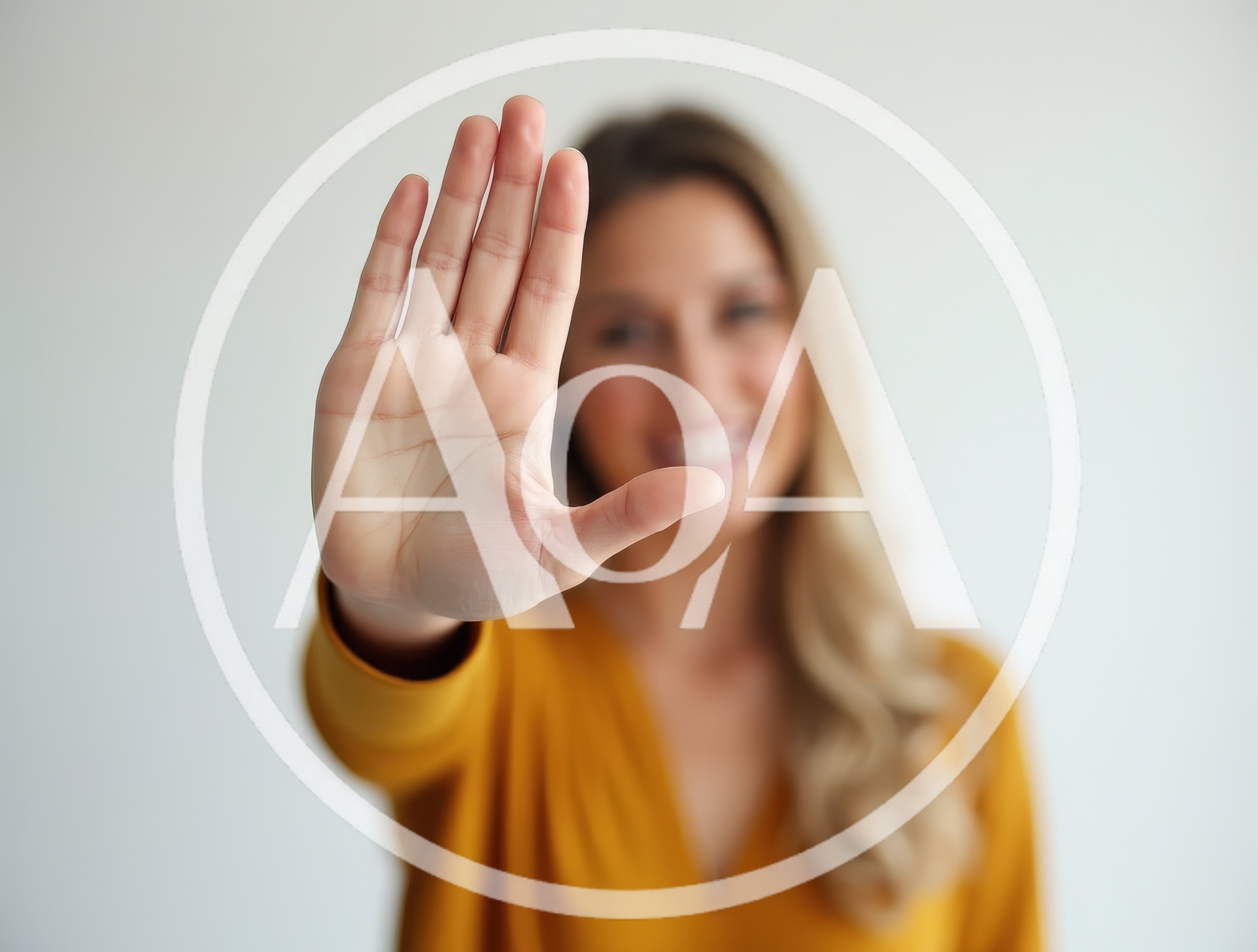Woman Holding Up Hand In A Stop Gesture