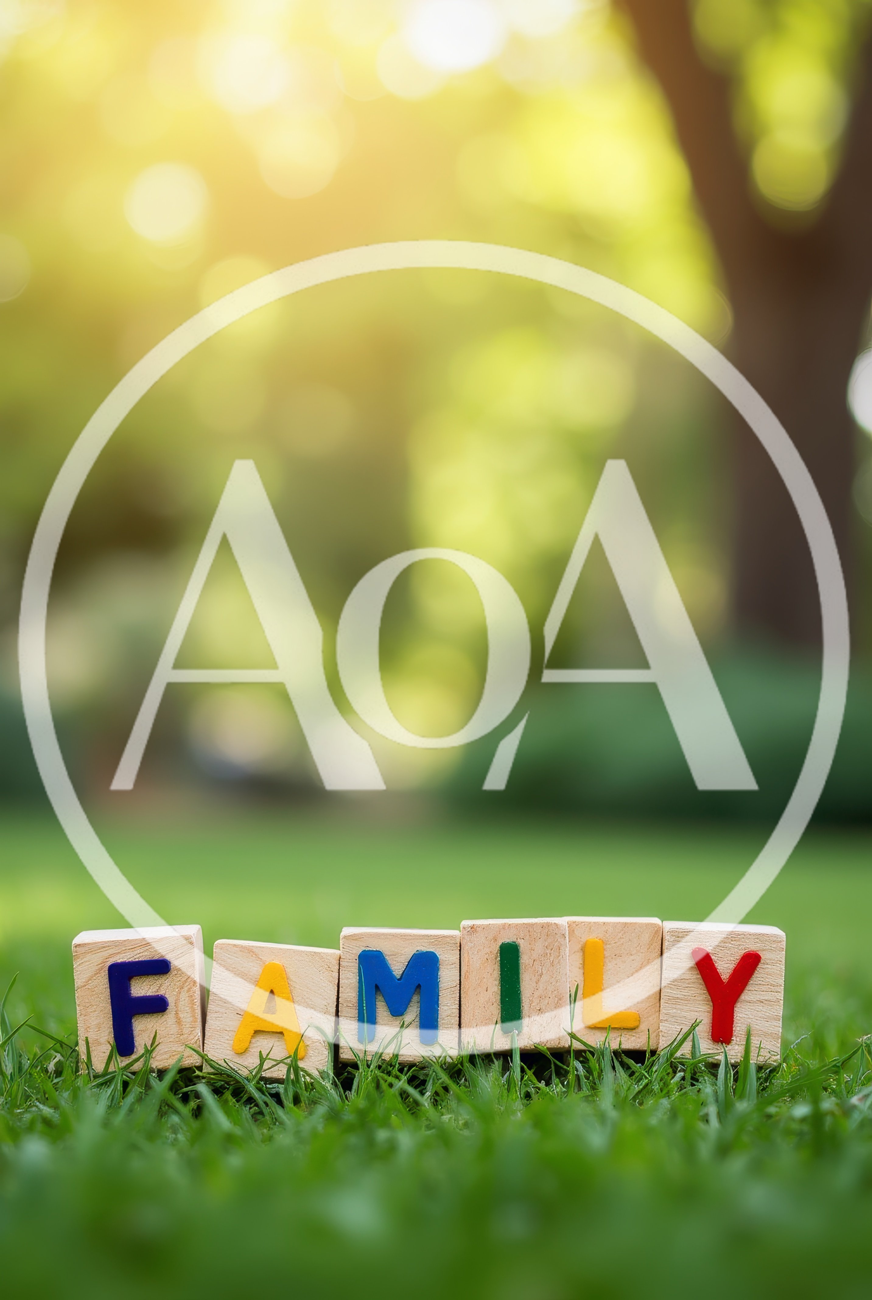 Wooden Blocks Spelling Family on Green Grass