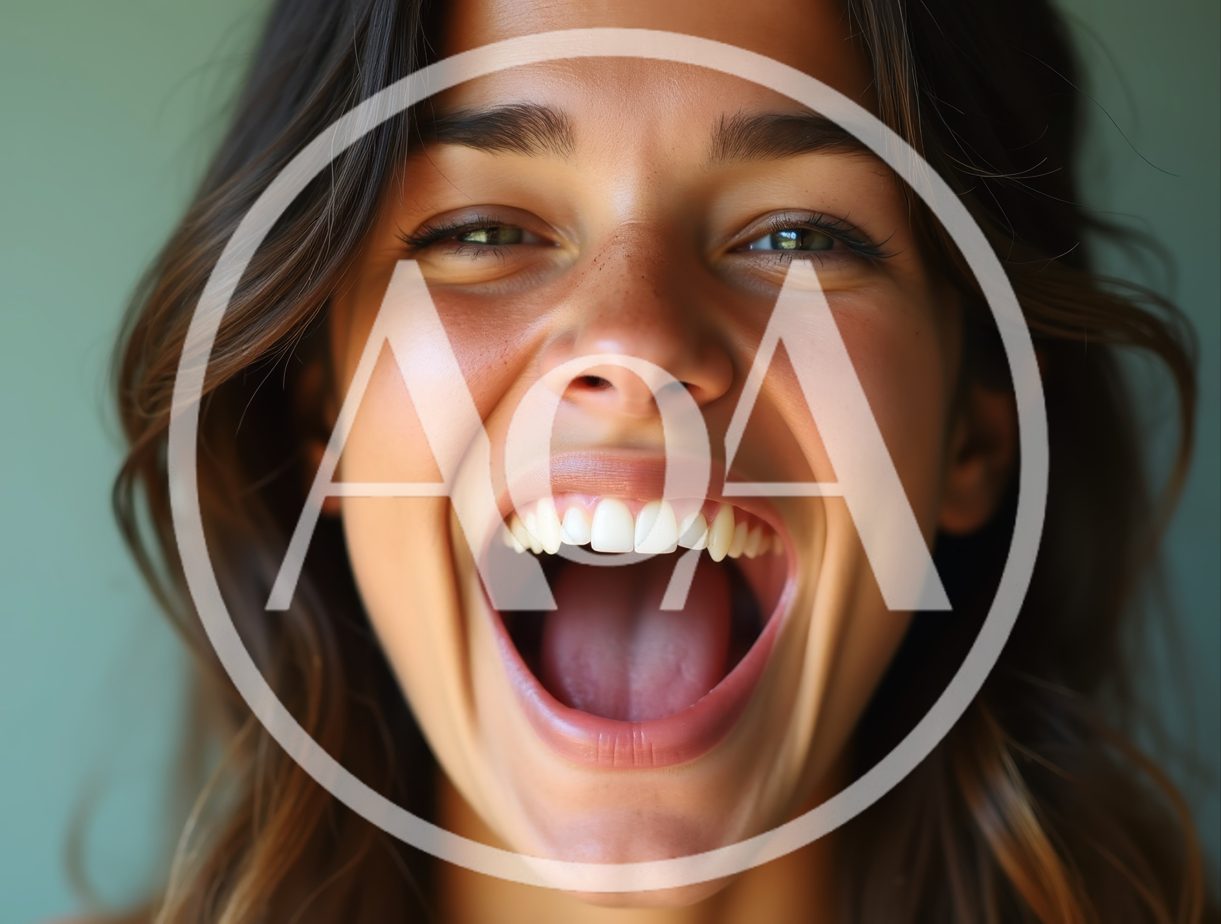 Close Up Portrait Of A Laughing Young Woman