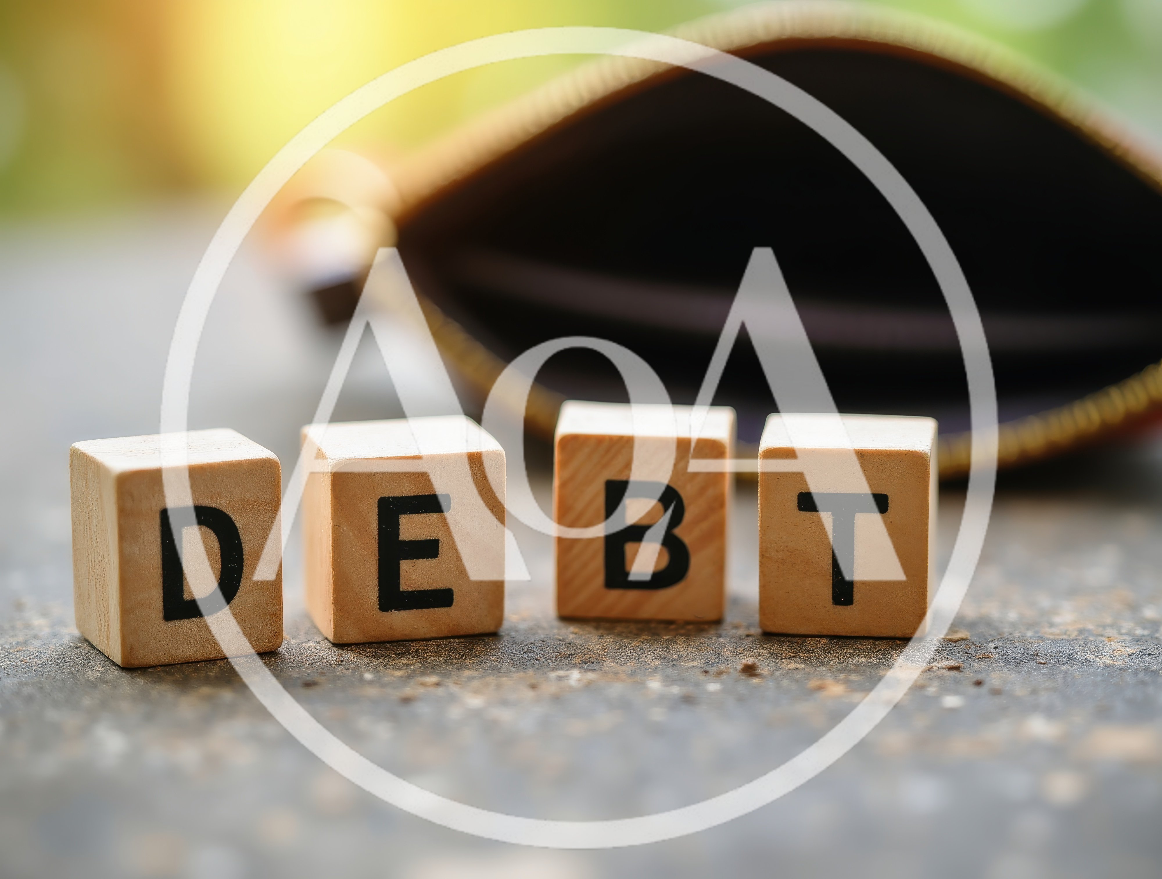 Wooden Blocks Spelling Debt With An Empty Wallet