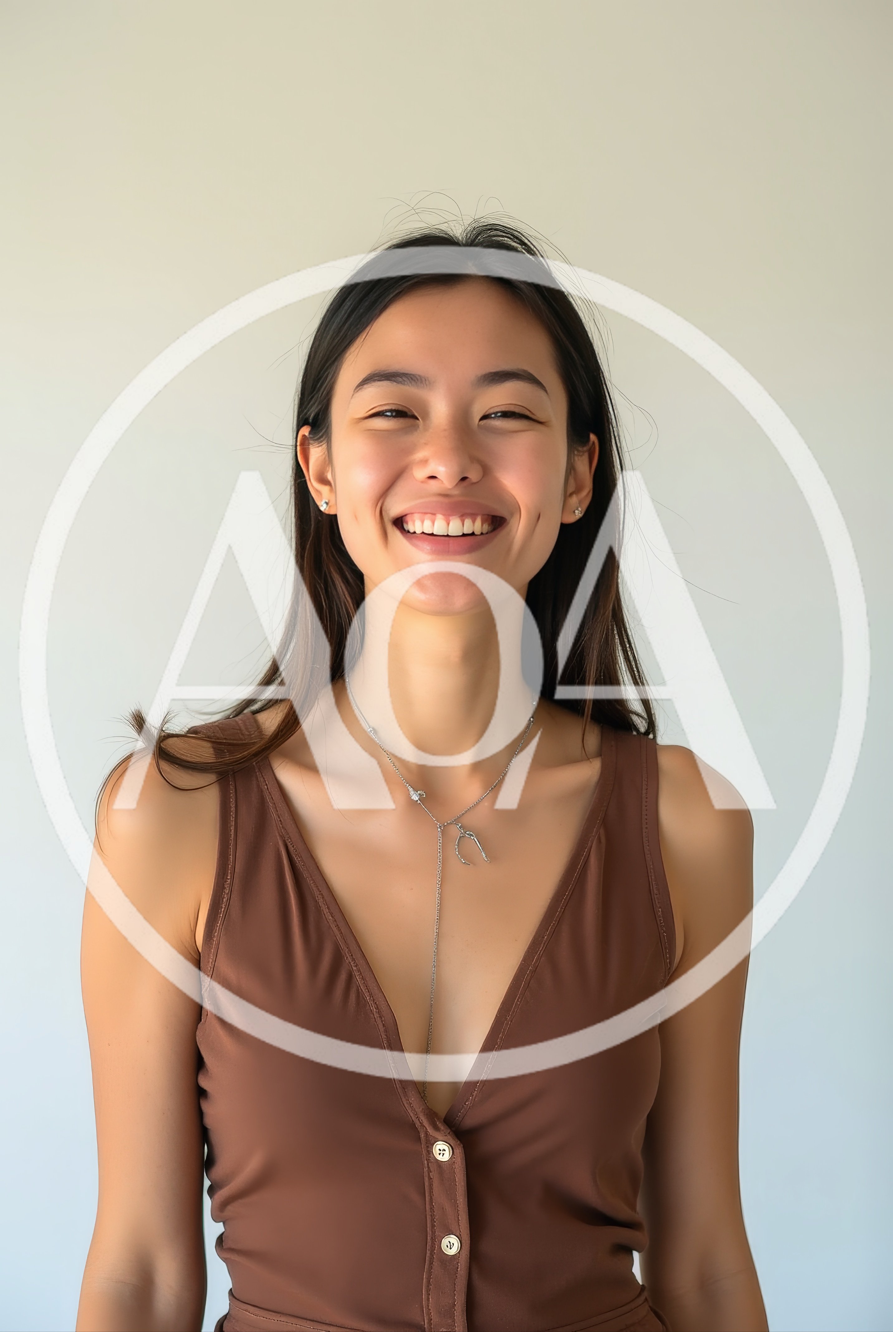 Portrait Of A Smiling Young Asian Woman