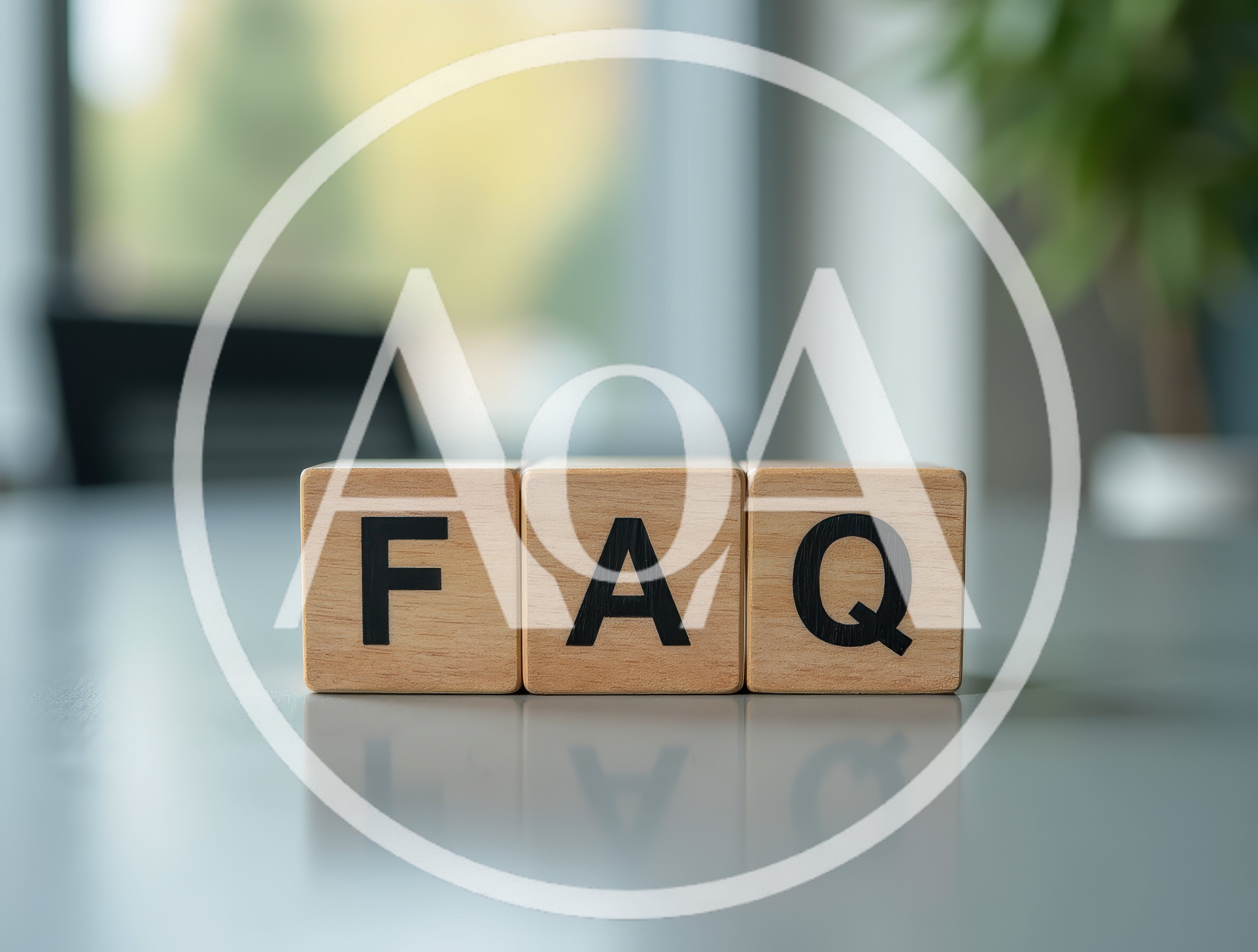 Wooden Blocks Spelling FAQ On A Desk