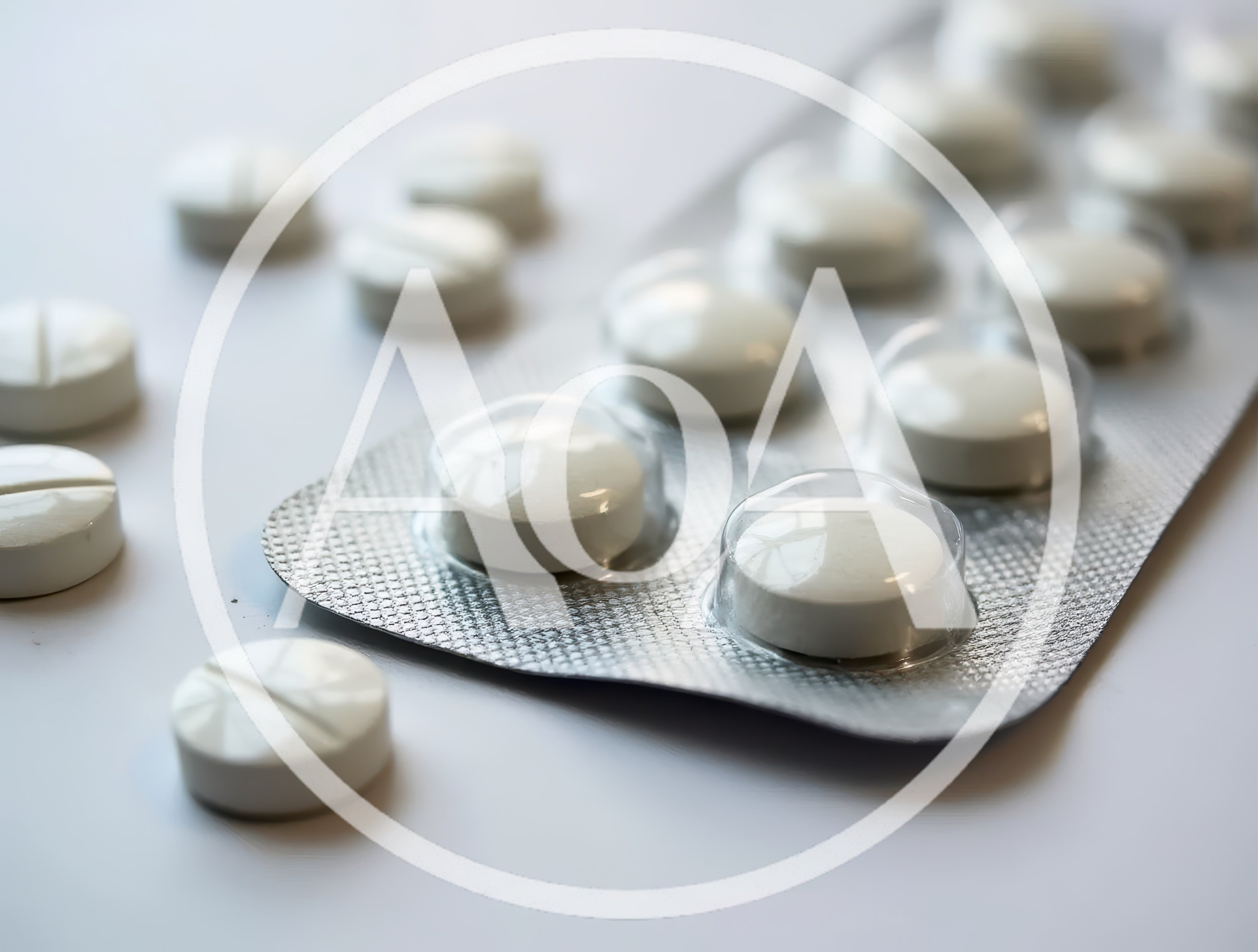 White Medical Pills In Blister Pack And Loose