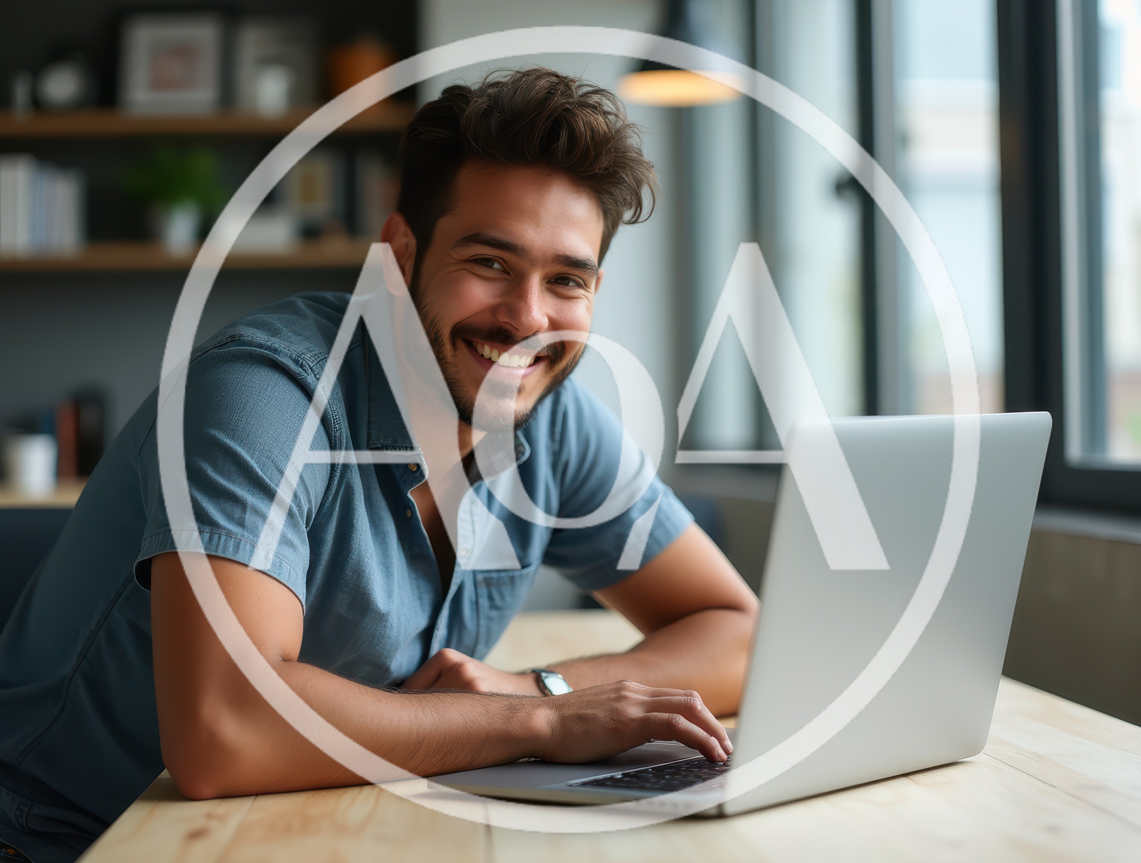 Smiling Young Man Working On Laptop In Modern Office