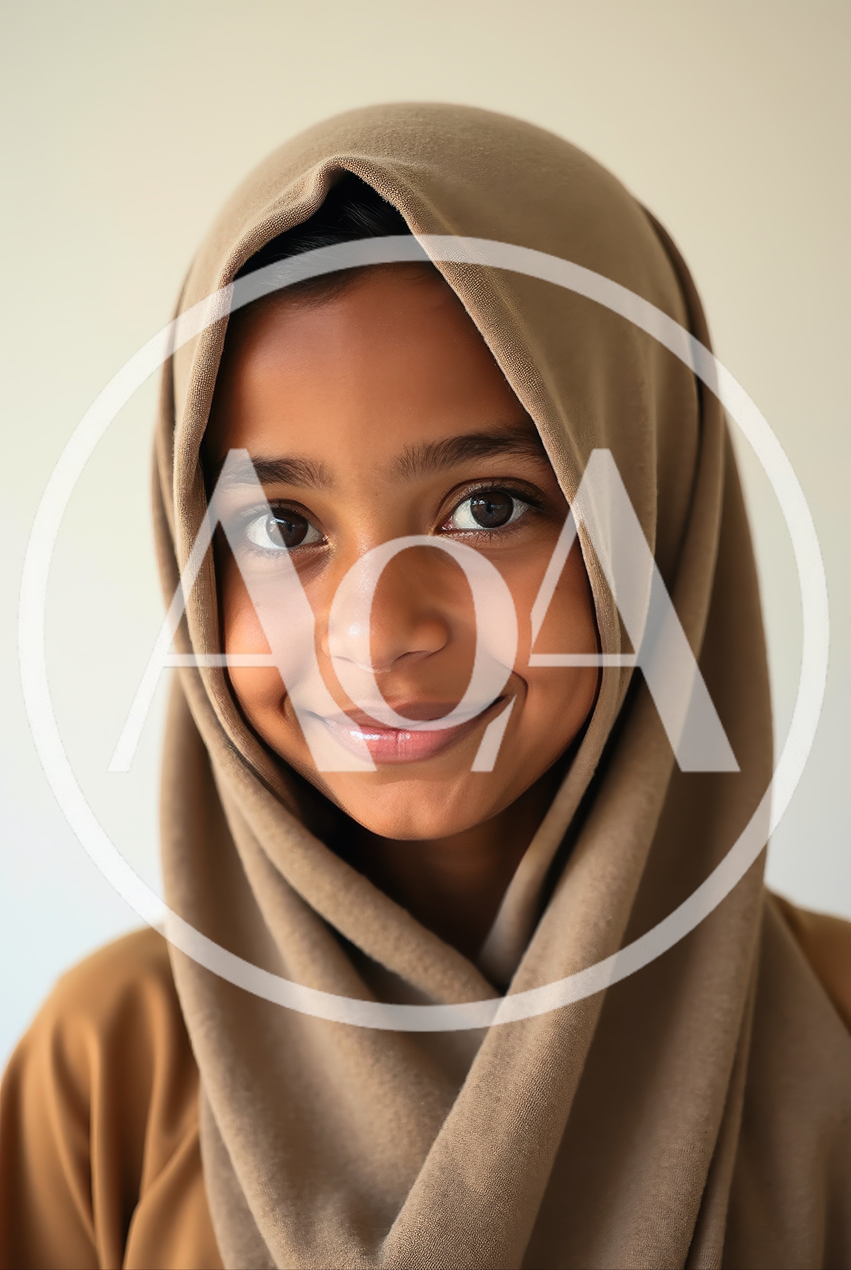 Portrait Of A Young Girl Wearing A Hijab