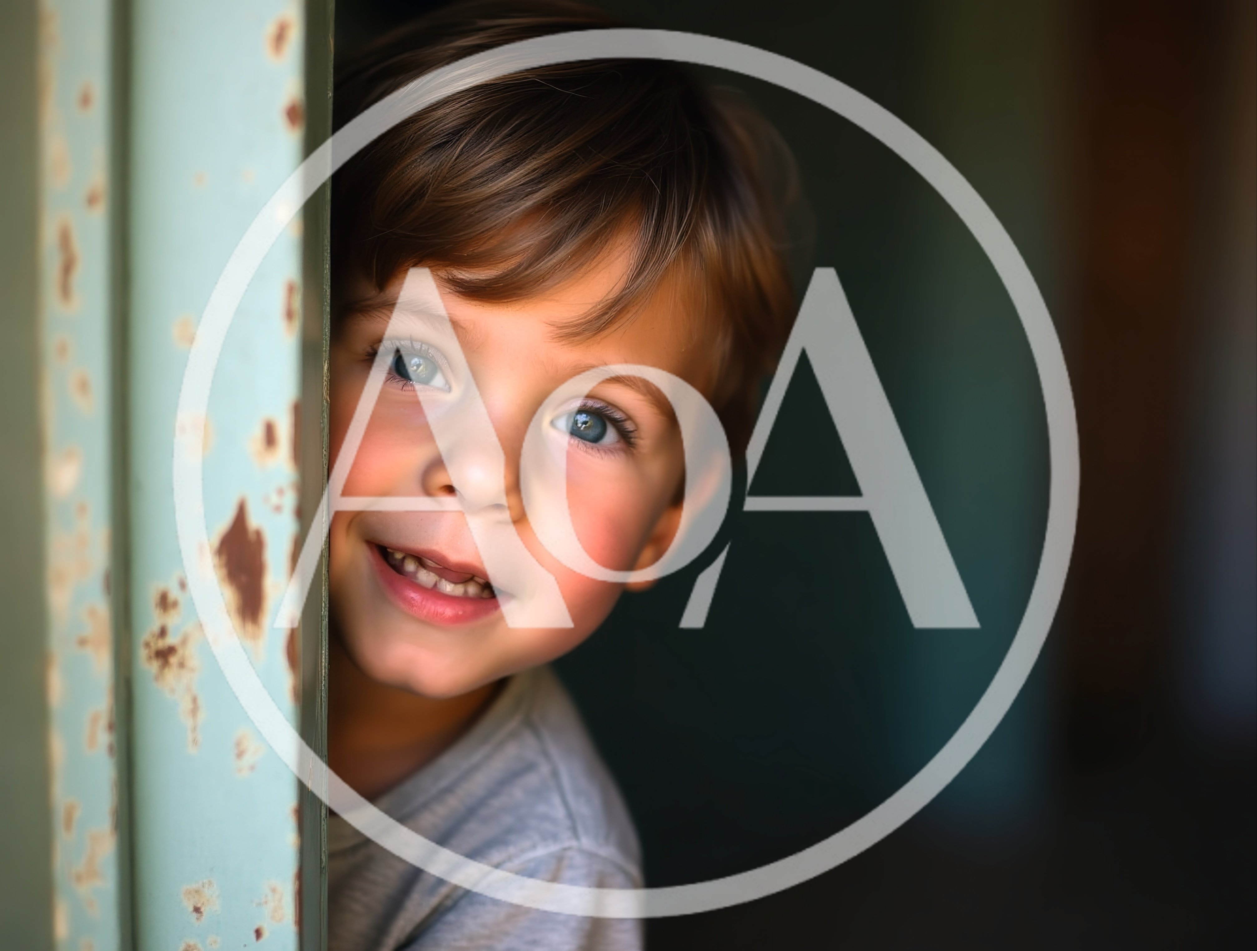 Young Boy Peeking From Behind A Doorway