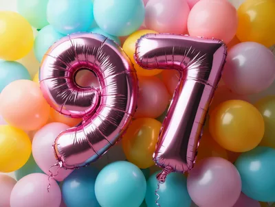 Pink Number Ninety Seven Balloons Against Colorful Background