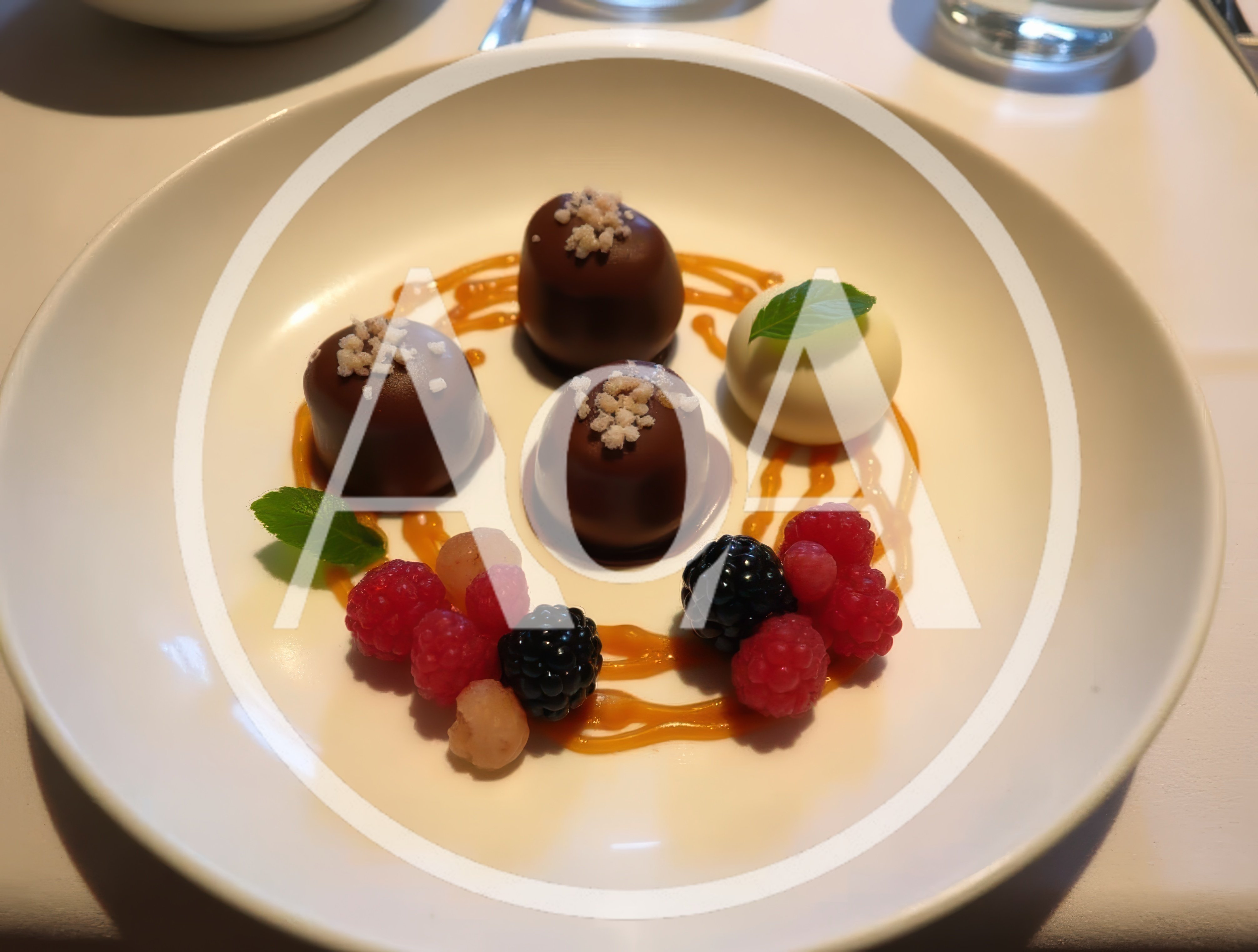 Gourmet Chocolate Dessert Plated With Fresh Berries