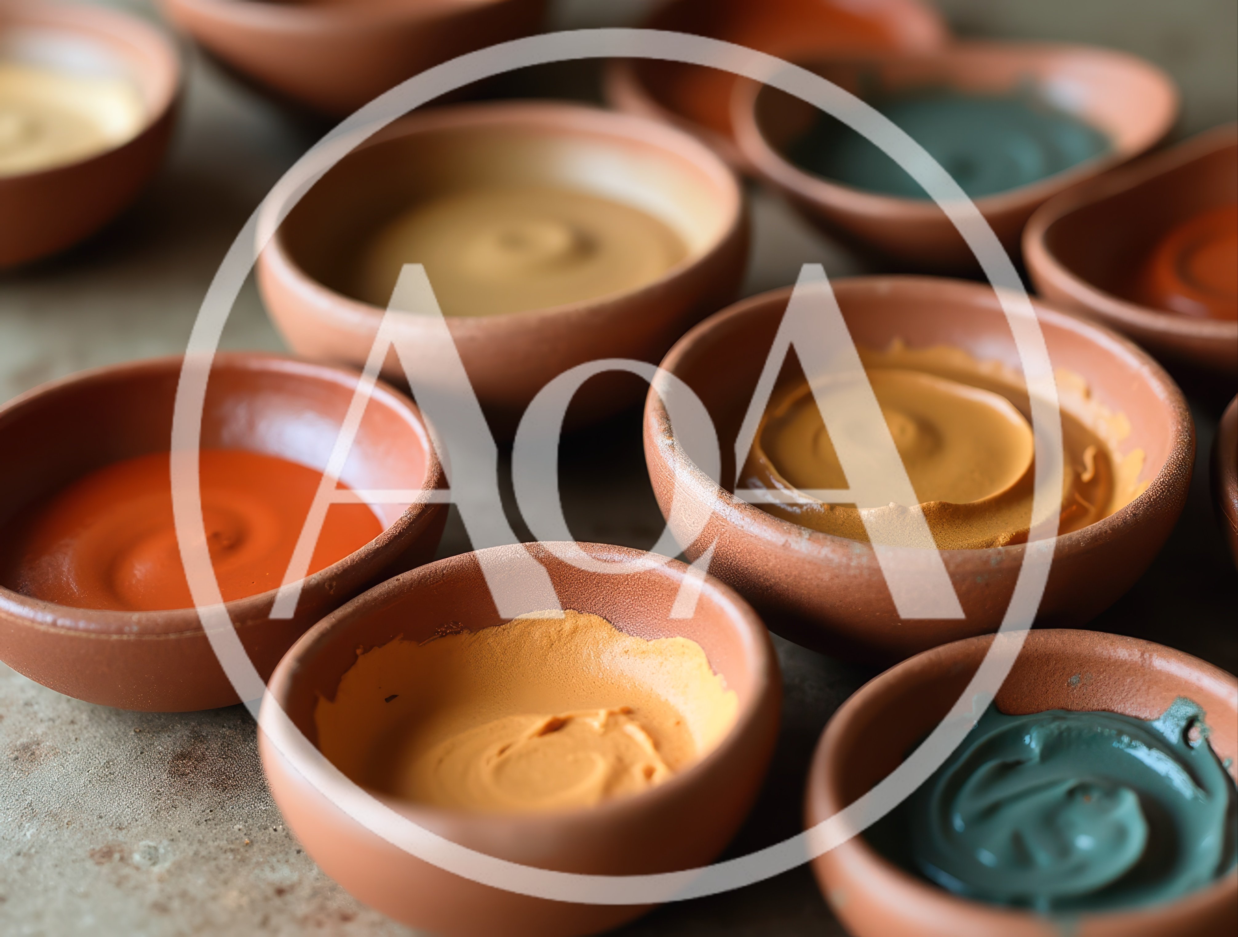 Assorted Pigment Paints In Small Clay Bowls