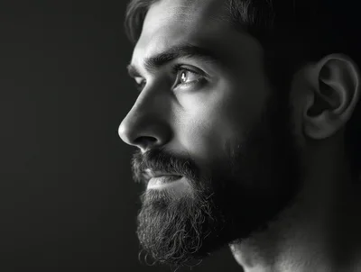 Close Up Portrait Of A Bearded Man In Profile