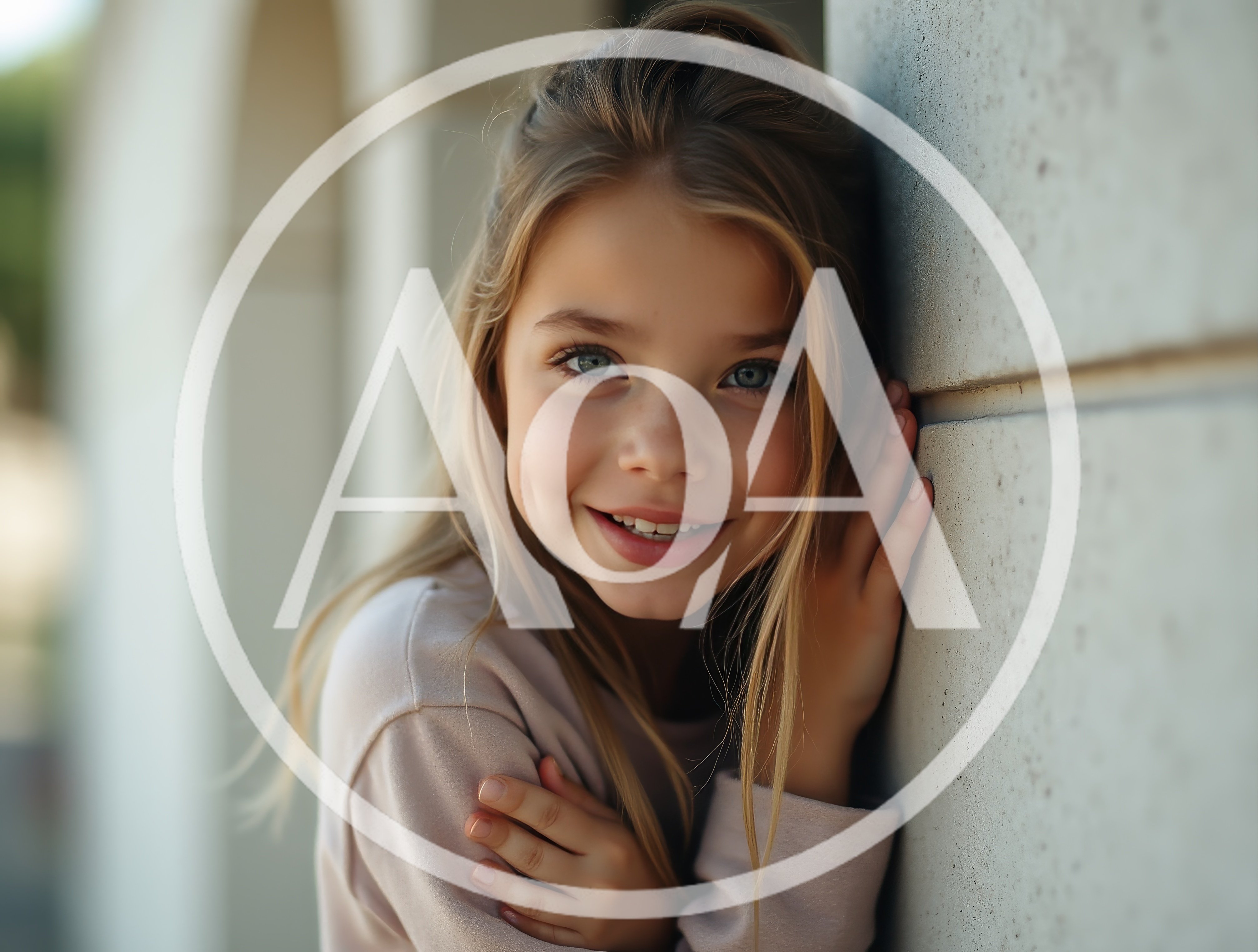 Portrait Of A Smiling Young Girl Leaning Against Wall