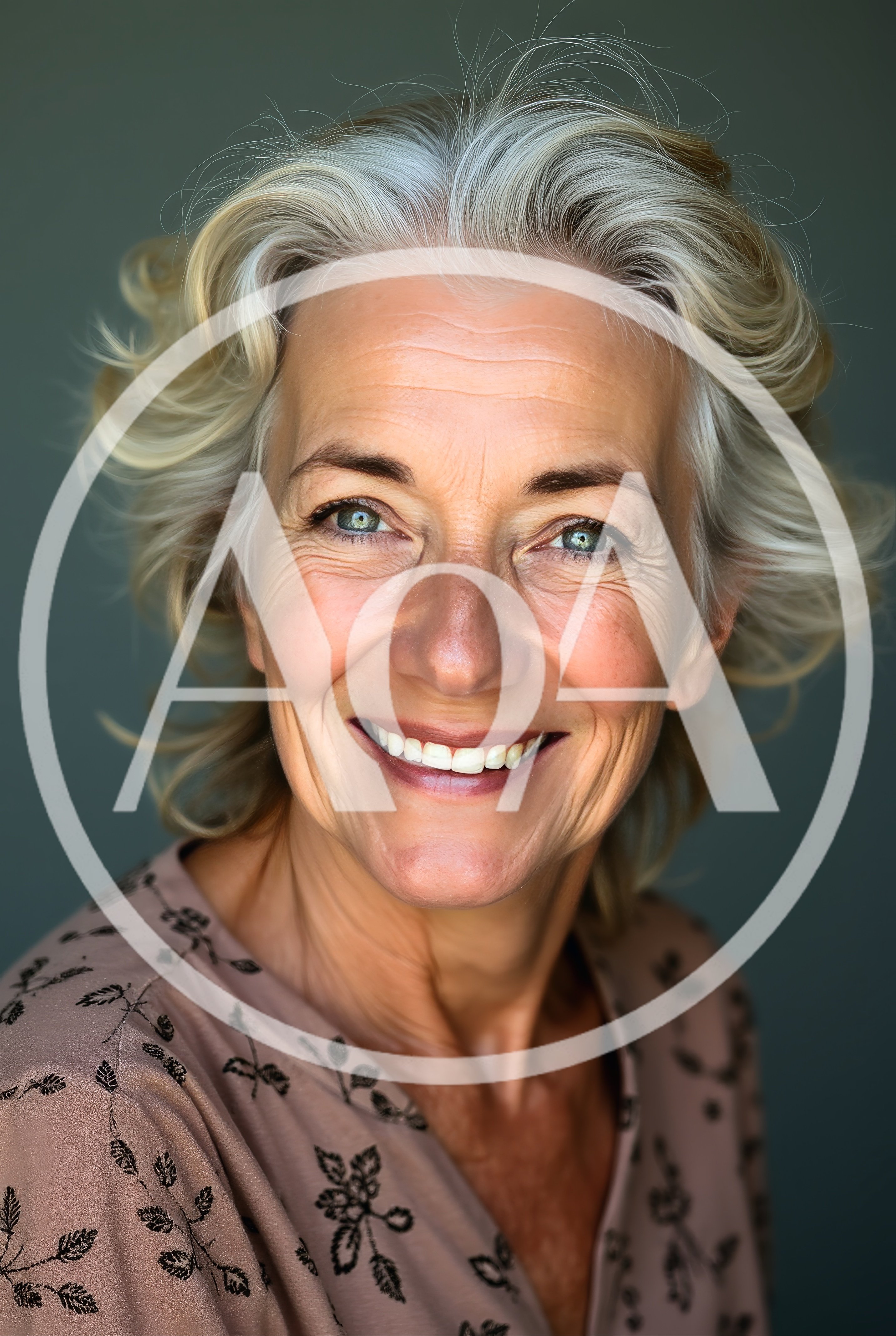 Portrait Of A Smiling Mature Woman With Silver Hair
