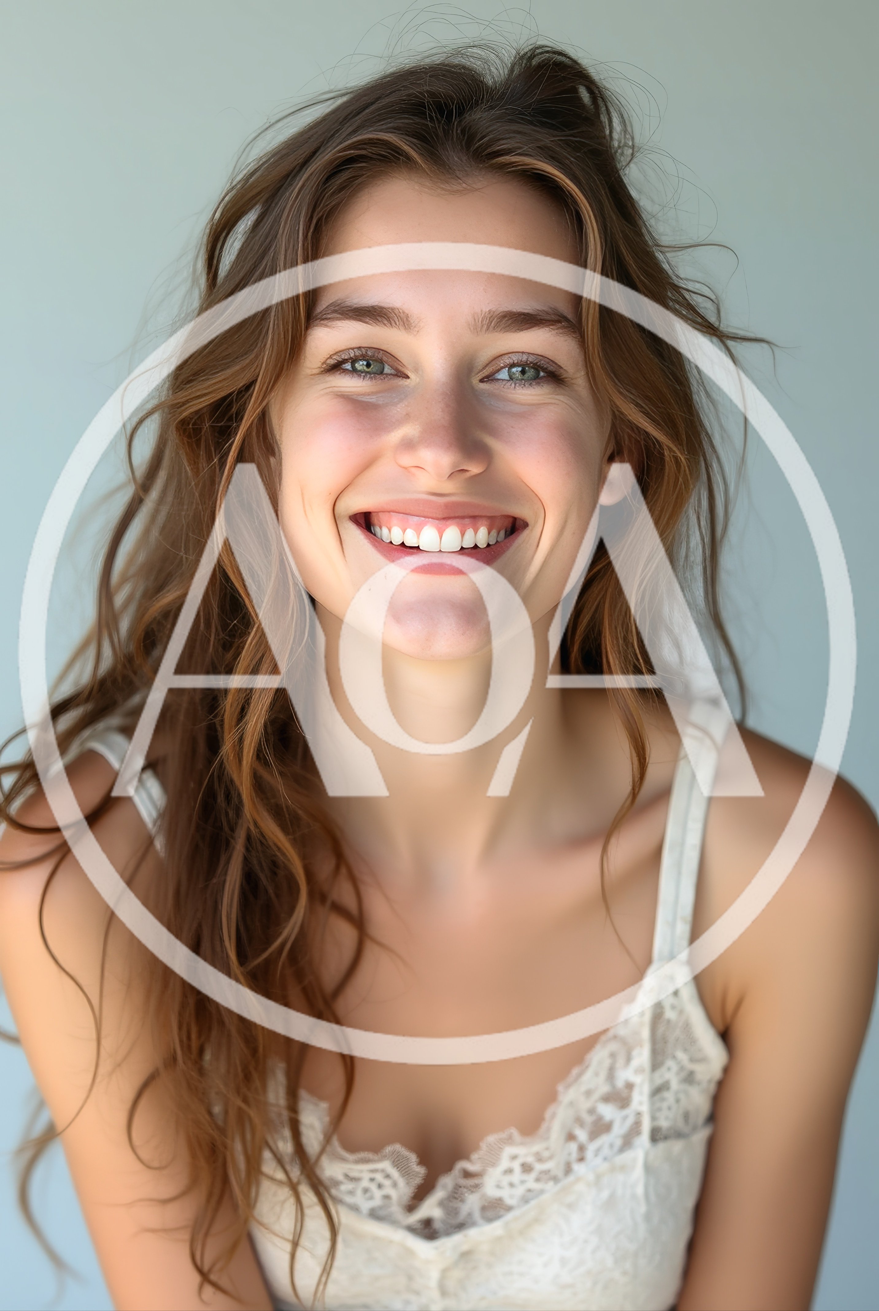Portrait Of A Smiling Young Woman With Wavy Hair