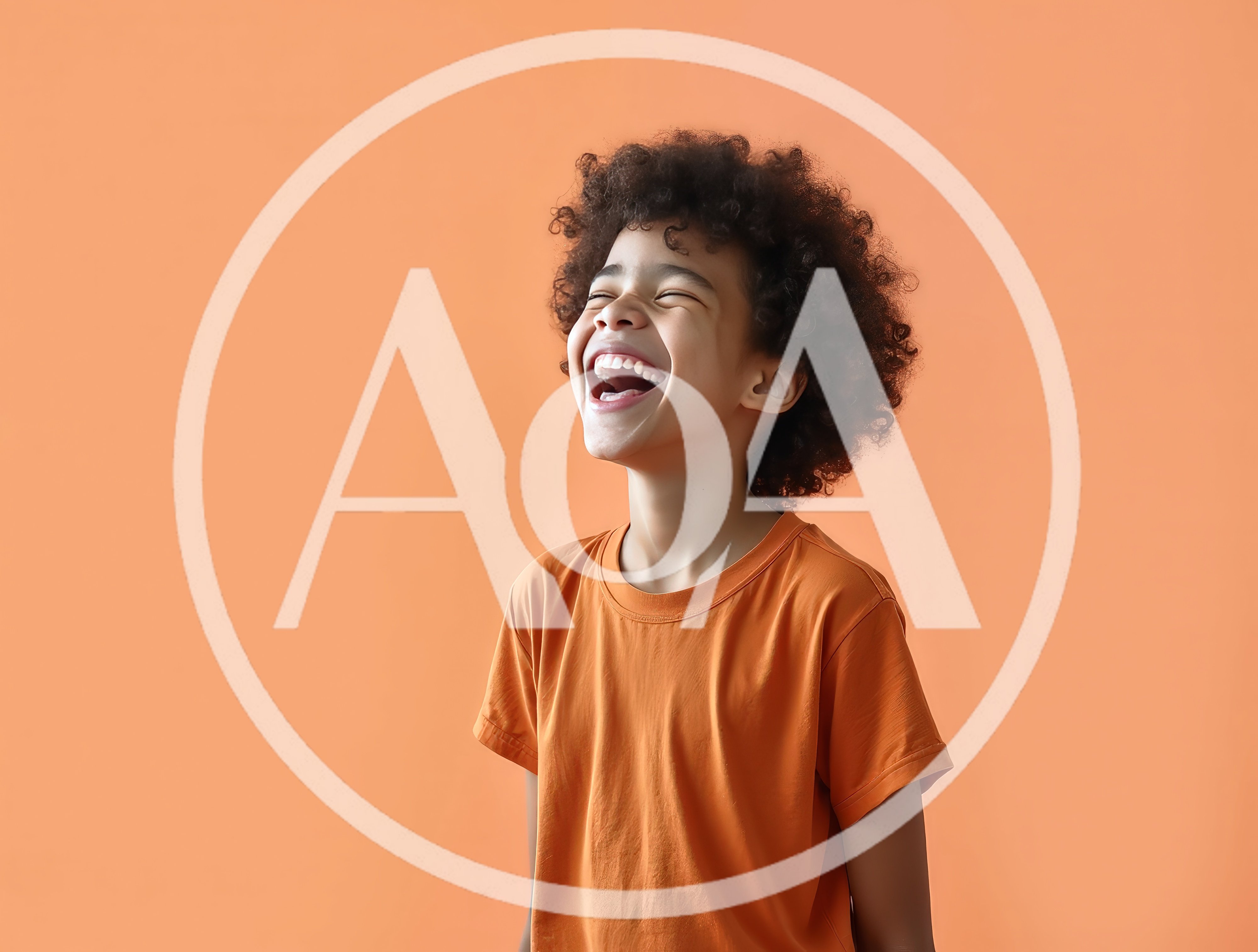 Happy Young Boy Laughing With Eyes Closed