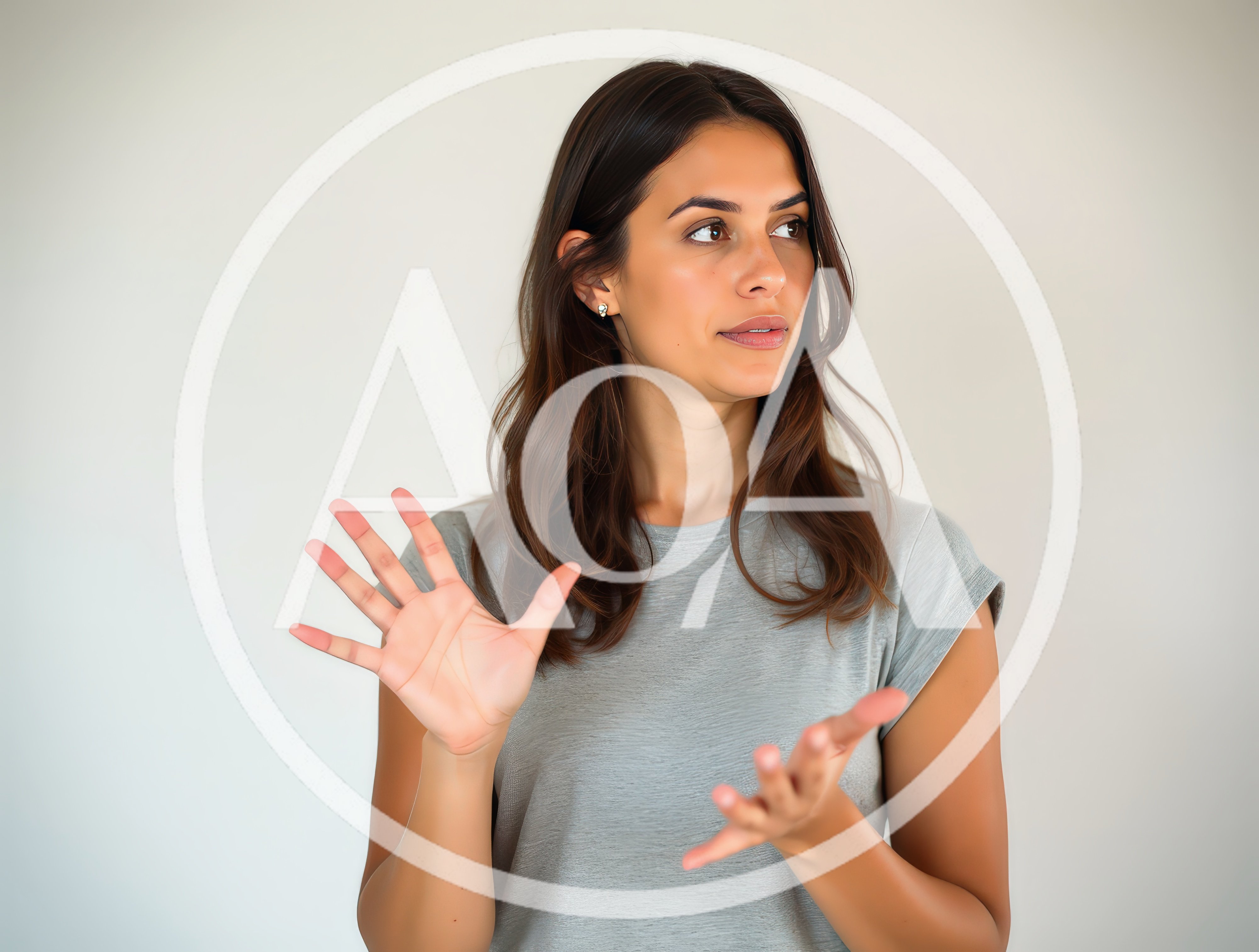 Young Woman Gesturing With Hands In Studio