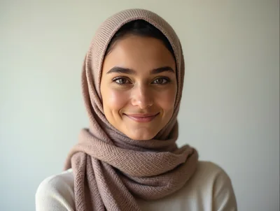 Portrait Of A Smiling Young Woman Wearing A Hijab