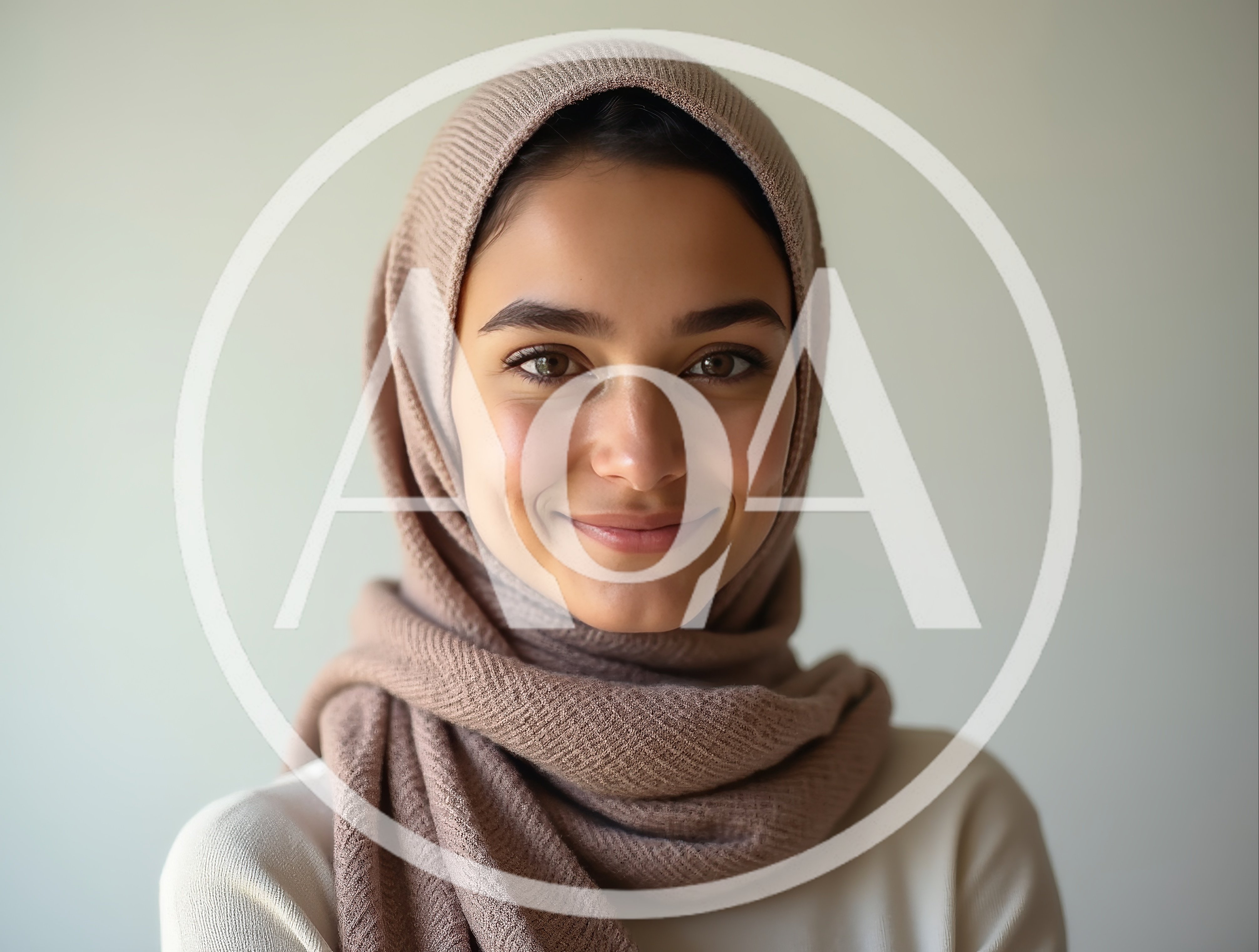 Portrait Of A Smiling Young Woman Wearing A Hijab