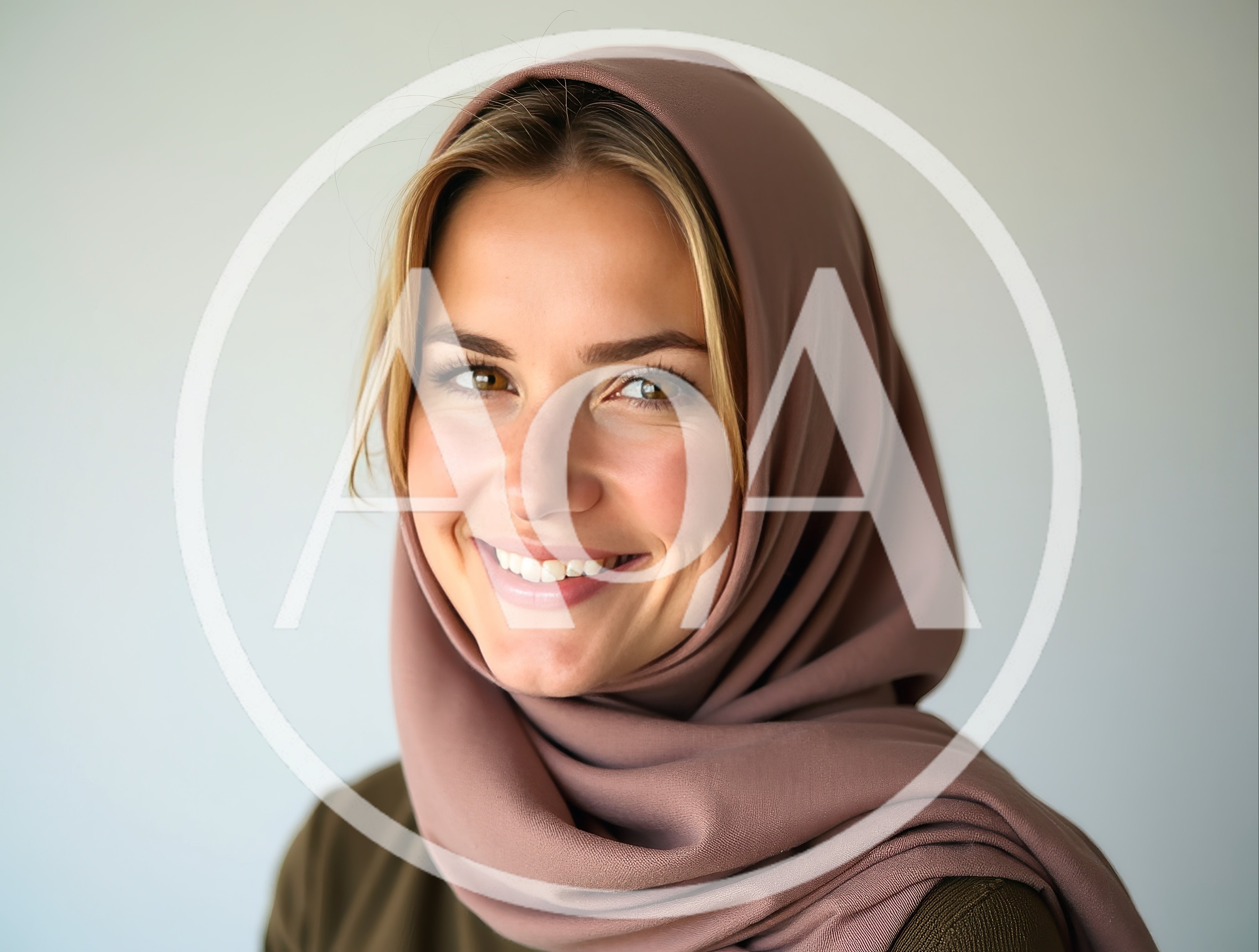 Portrait Of A Smiling Woman Wearing A Hijab