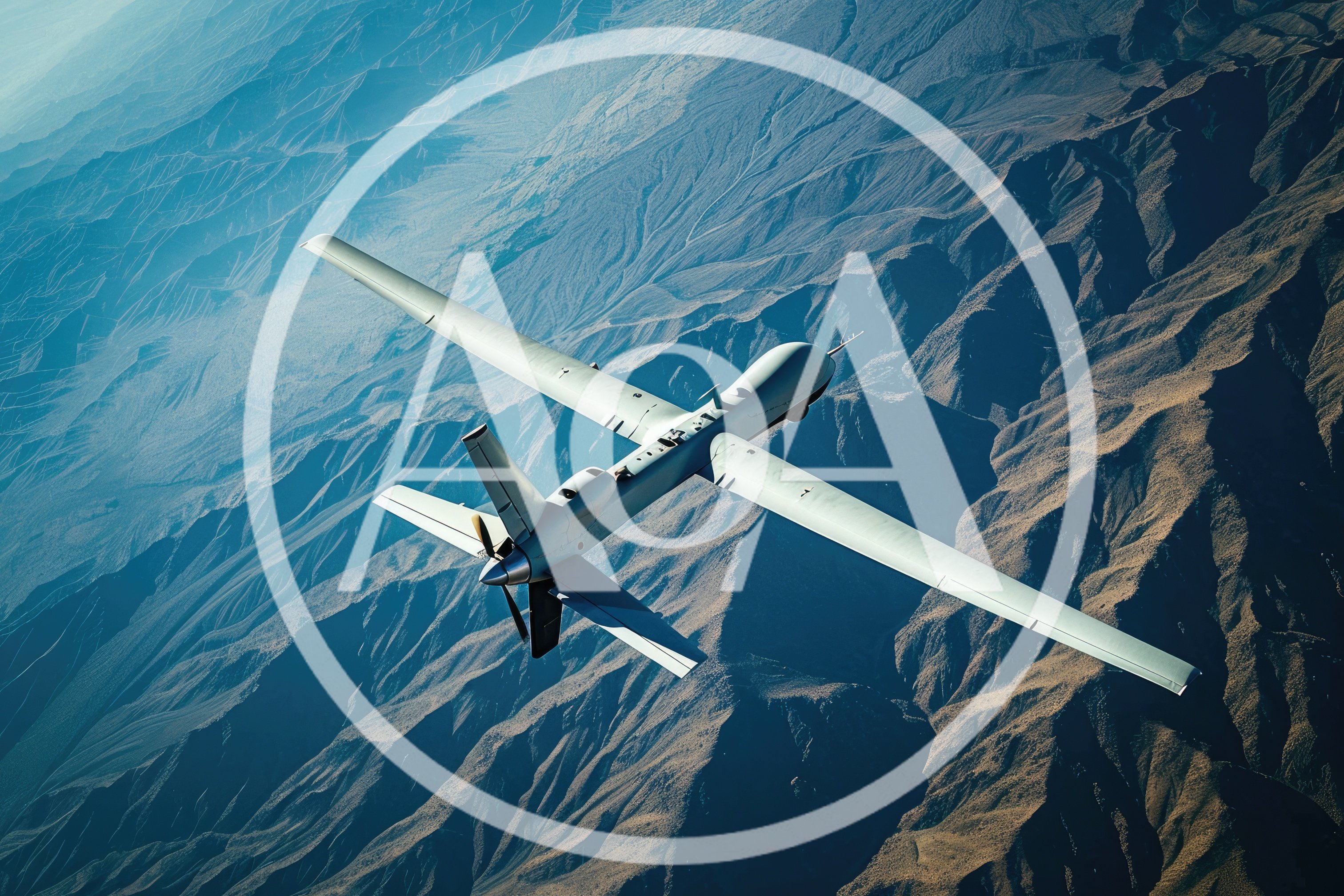 MQ-9 Reaper Drone Flying Over Rugged Mountain Terrain