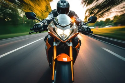Sport Motorcycle Riding Fast On A Scenic Road