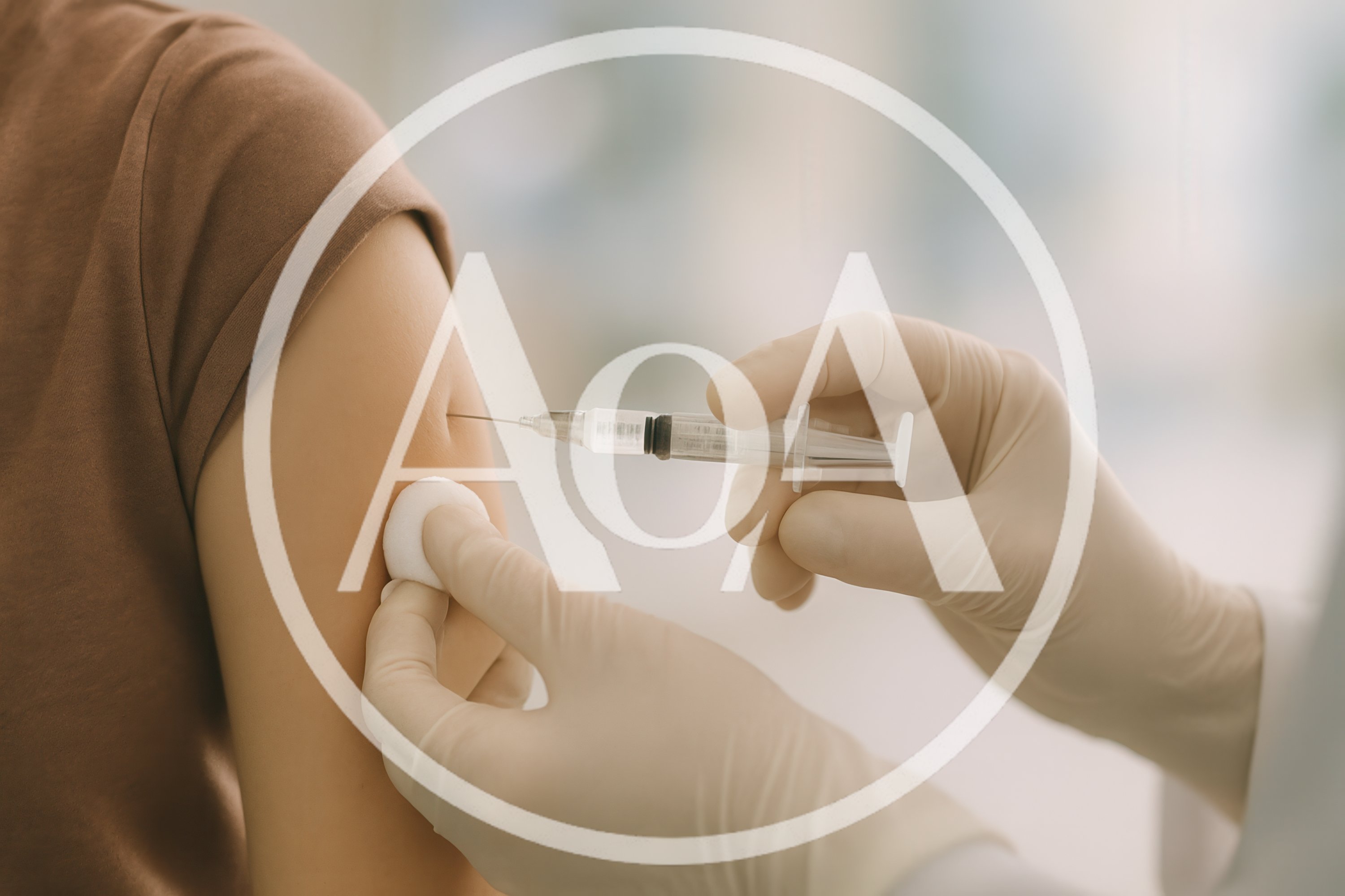 Medical Professional Administering Vaccine Injection To Patient