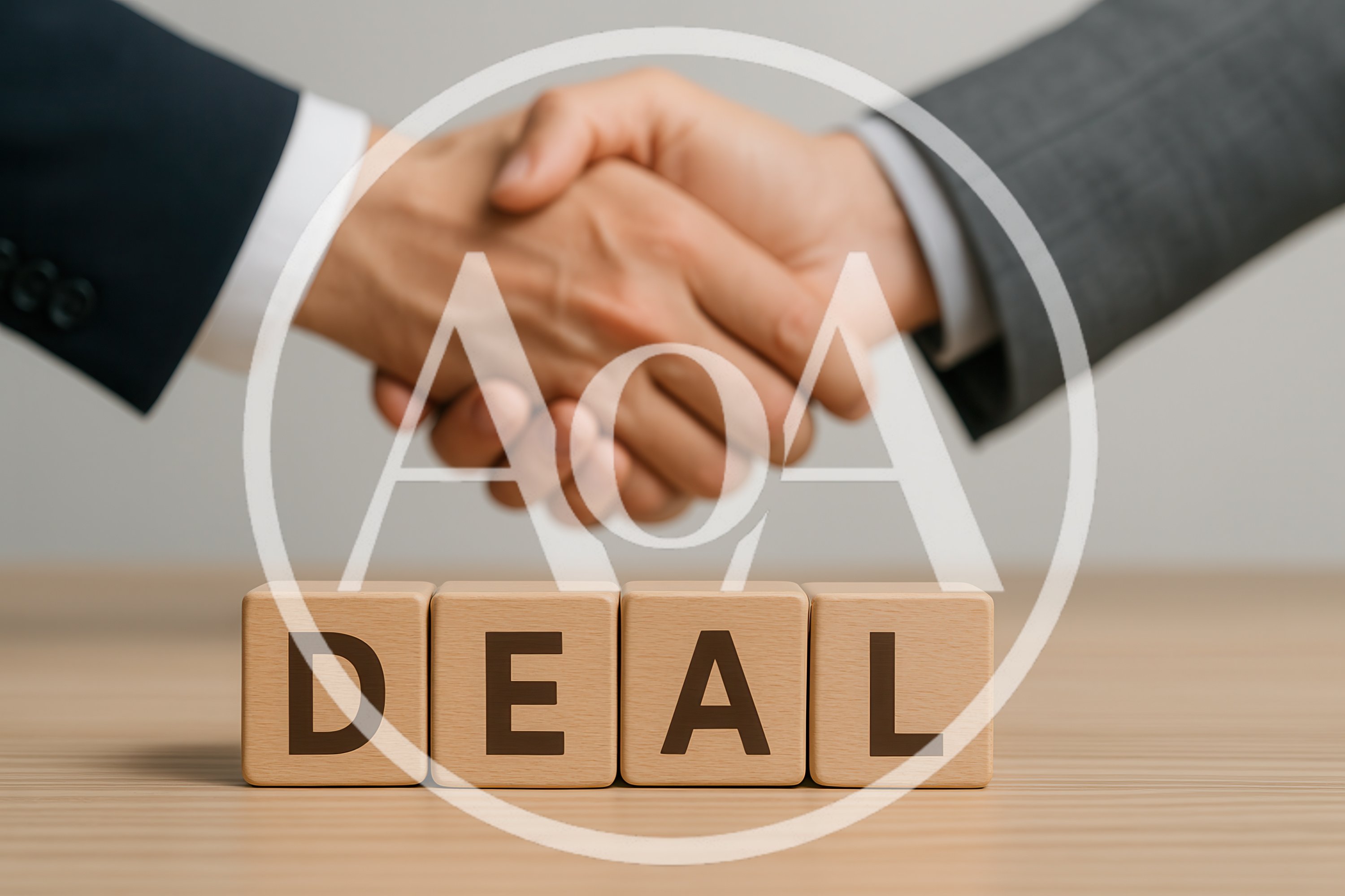 Business Partners Shaking Hands Over Wooden Deal Blocks