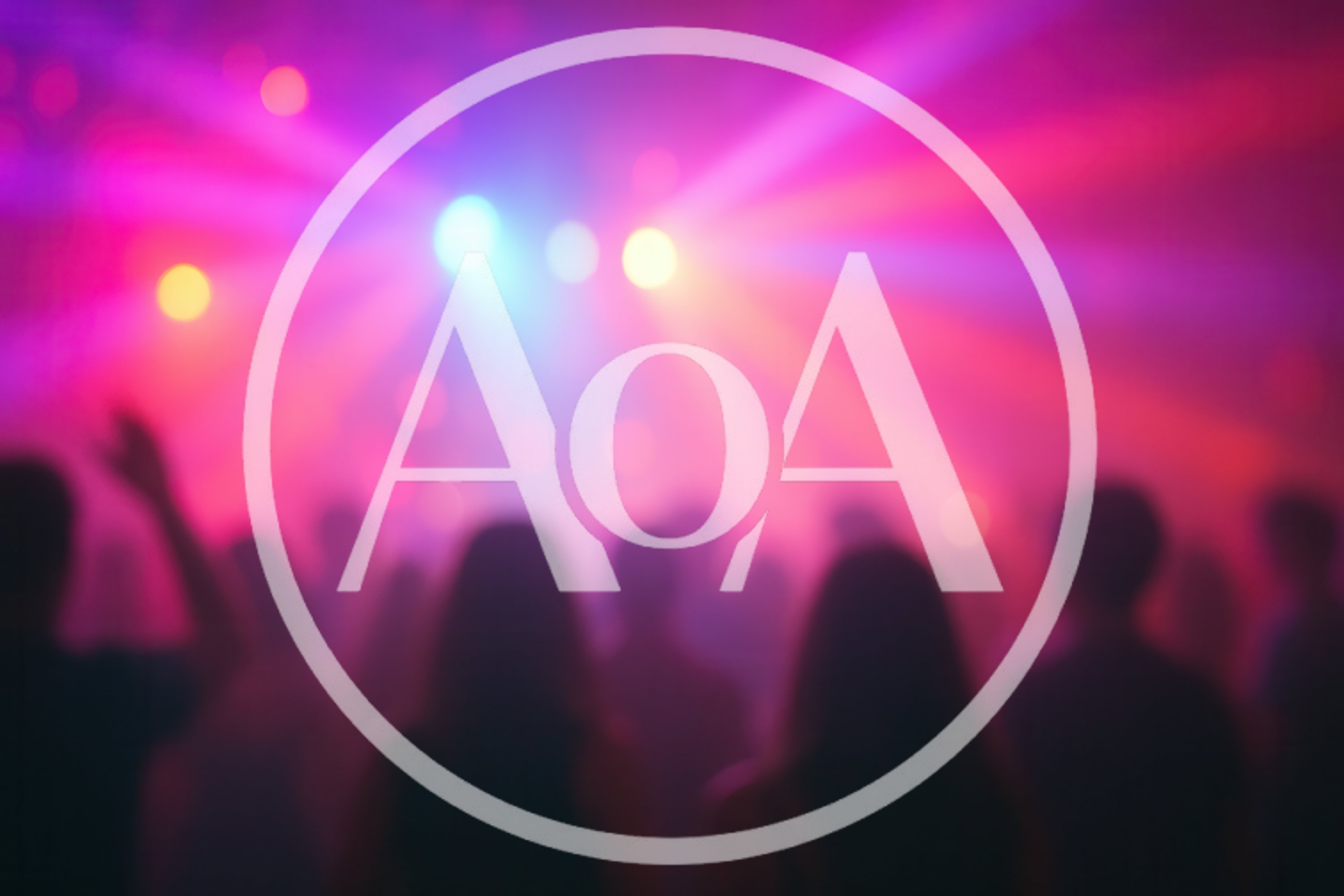 Crowd Dancing at a Nightclub with Colorful Stage Lights