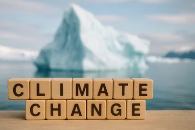 Climate Change Text On Wooden Blocks With Iceberg Background