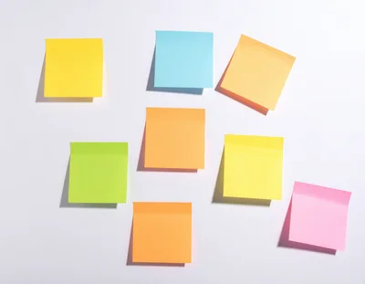 Colorful Blank Sticky Notes Arranged On White Background