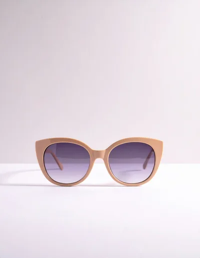 Beige Cat Eye Sunglasses On White Background