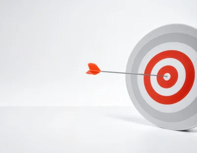 Dart Hitting The Center Of A Target