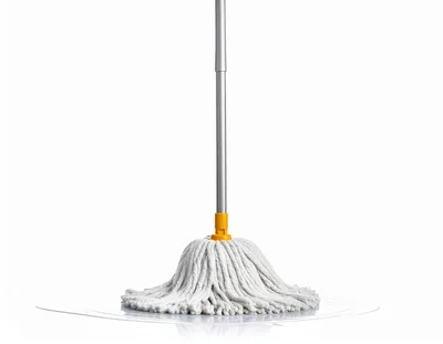 White Cotton String Mop Standing On Wet Floor