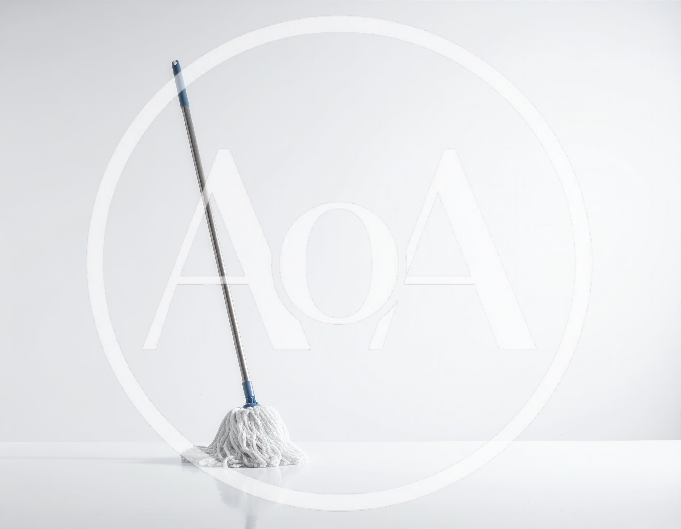 White Cotton Mop Standing Upright on White Background