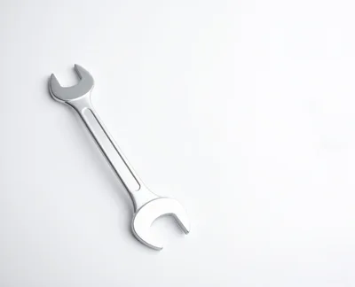 Silver Open Ended Wrench on White Background