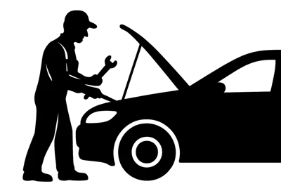 Silhouette Of A Mechanic Repairing A Car Engine