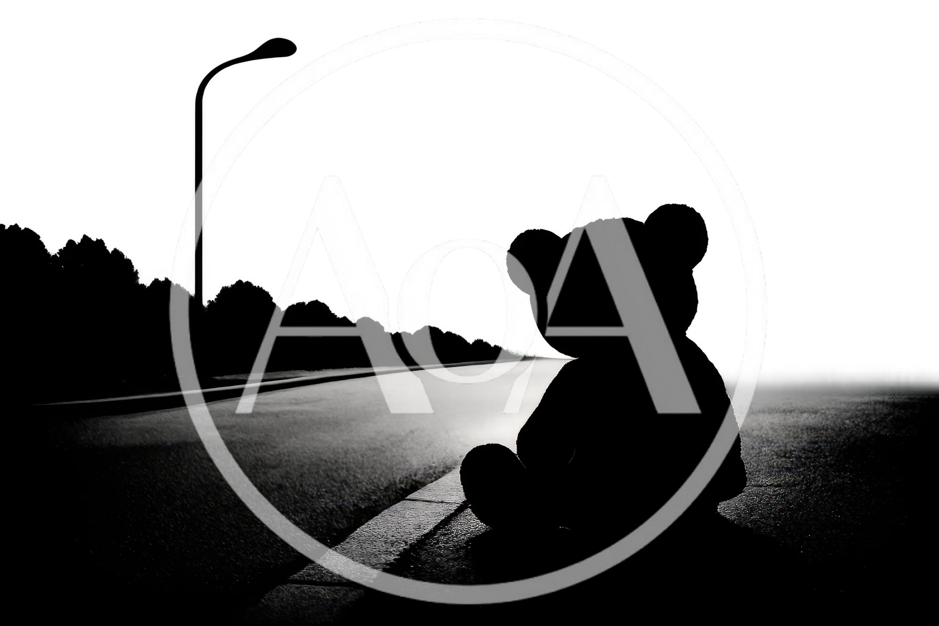 Silhouette Of A Lonely Teddy Bear On A Road