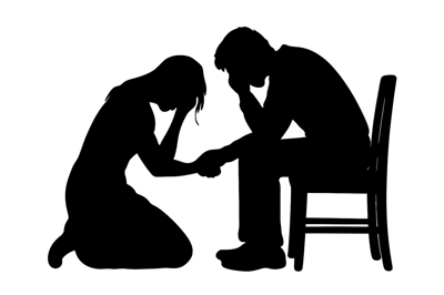 Silhouette Of A Couple In A Moment Of Grief