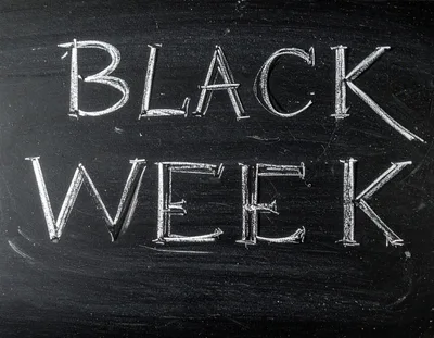Black Week Text Written In White Chalk On Blackboard
