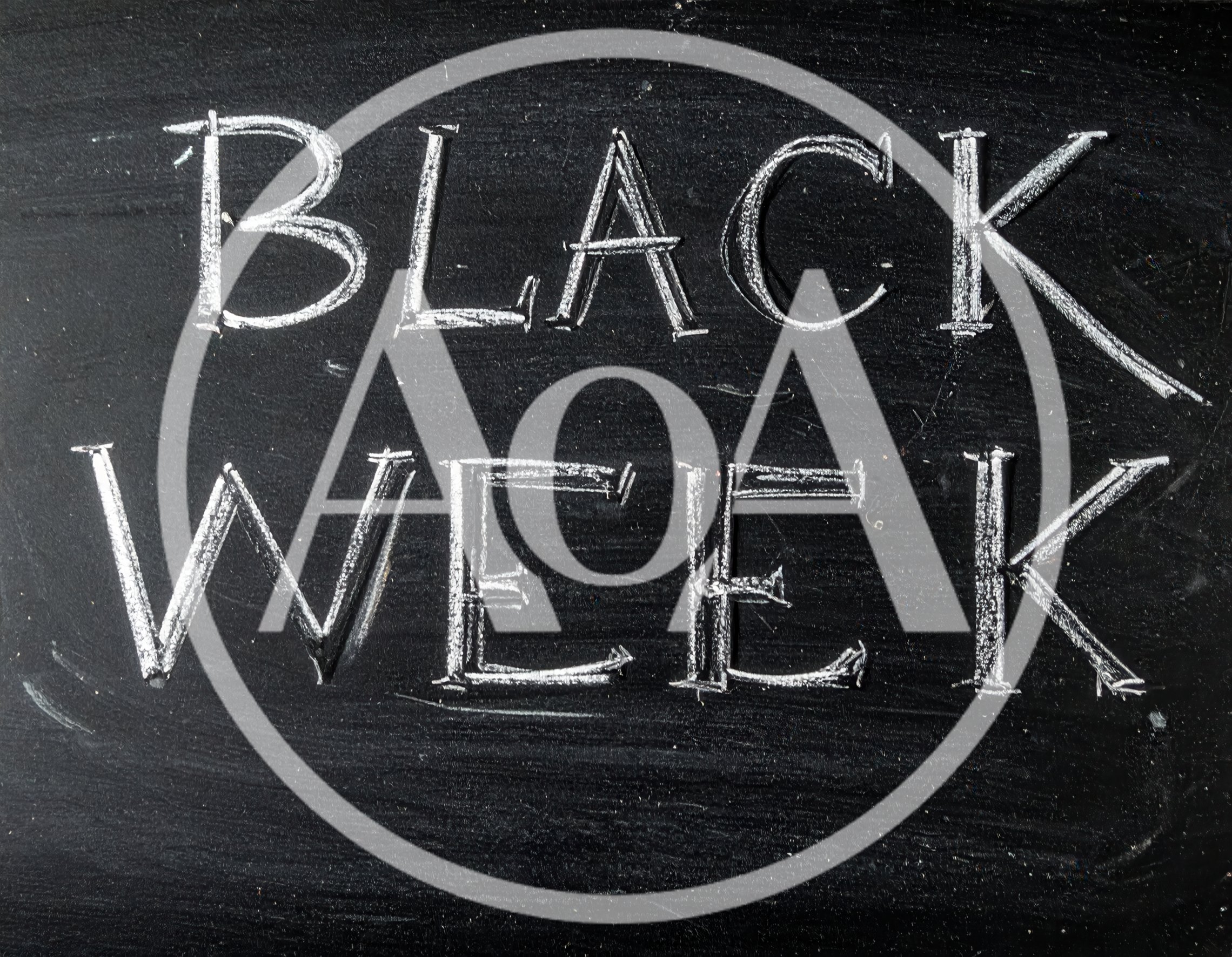 Black Week Text Written In White Chalk On Blackboard