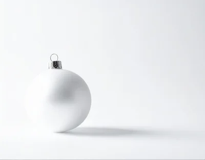 Single White Christmas Ornament On White Background