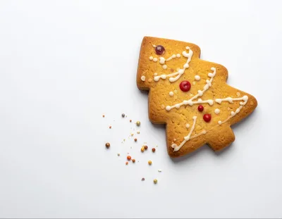 Christmas Tree Shaped Gingerbread Cookie On White Background