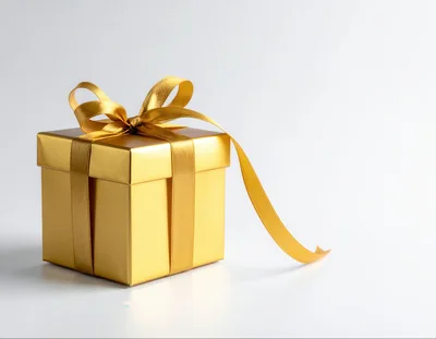 Golden Gift Box With Ribbon On White Background
