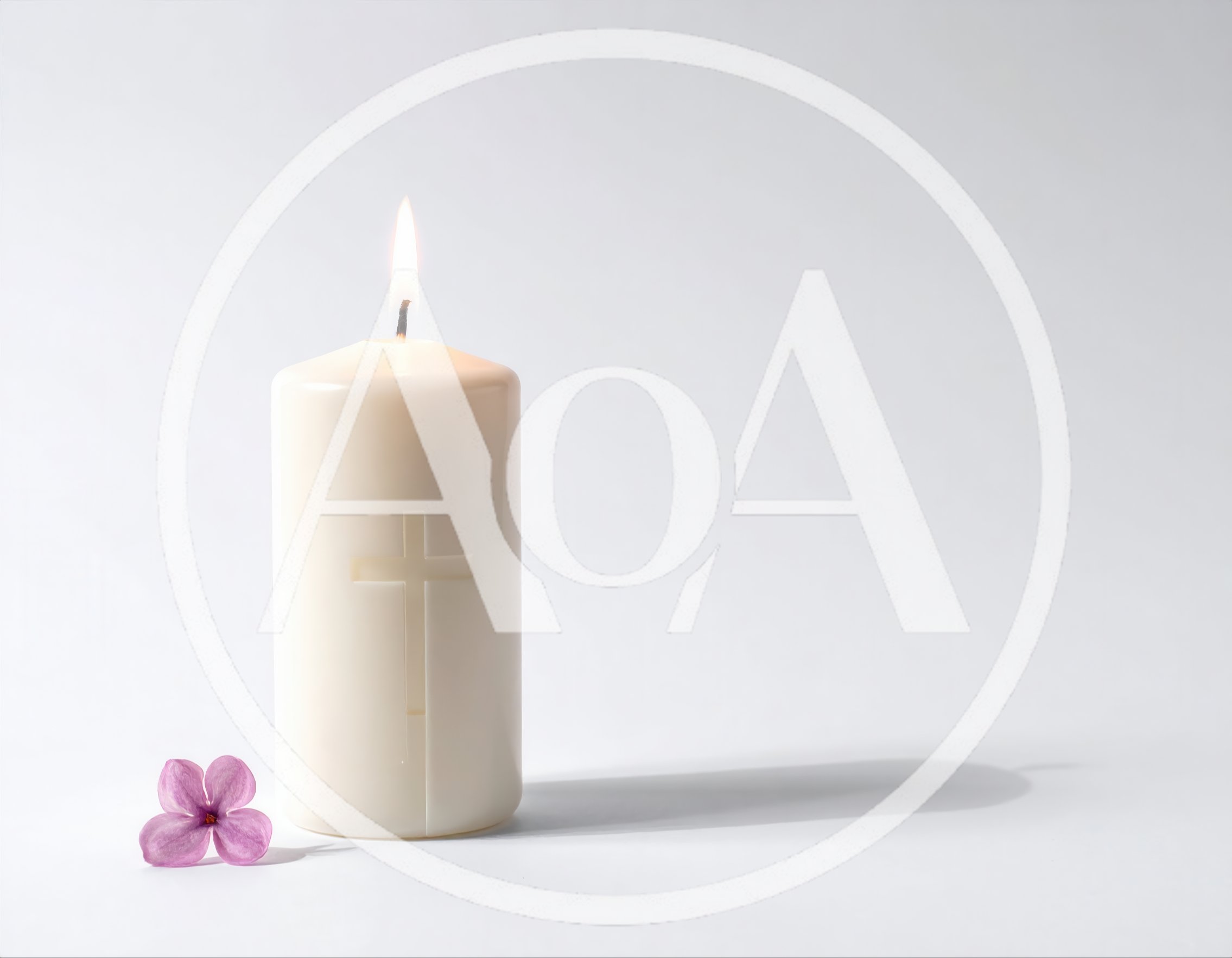 Lit White Candle With Cross And Lilac Flower