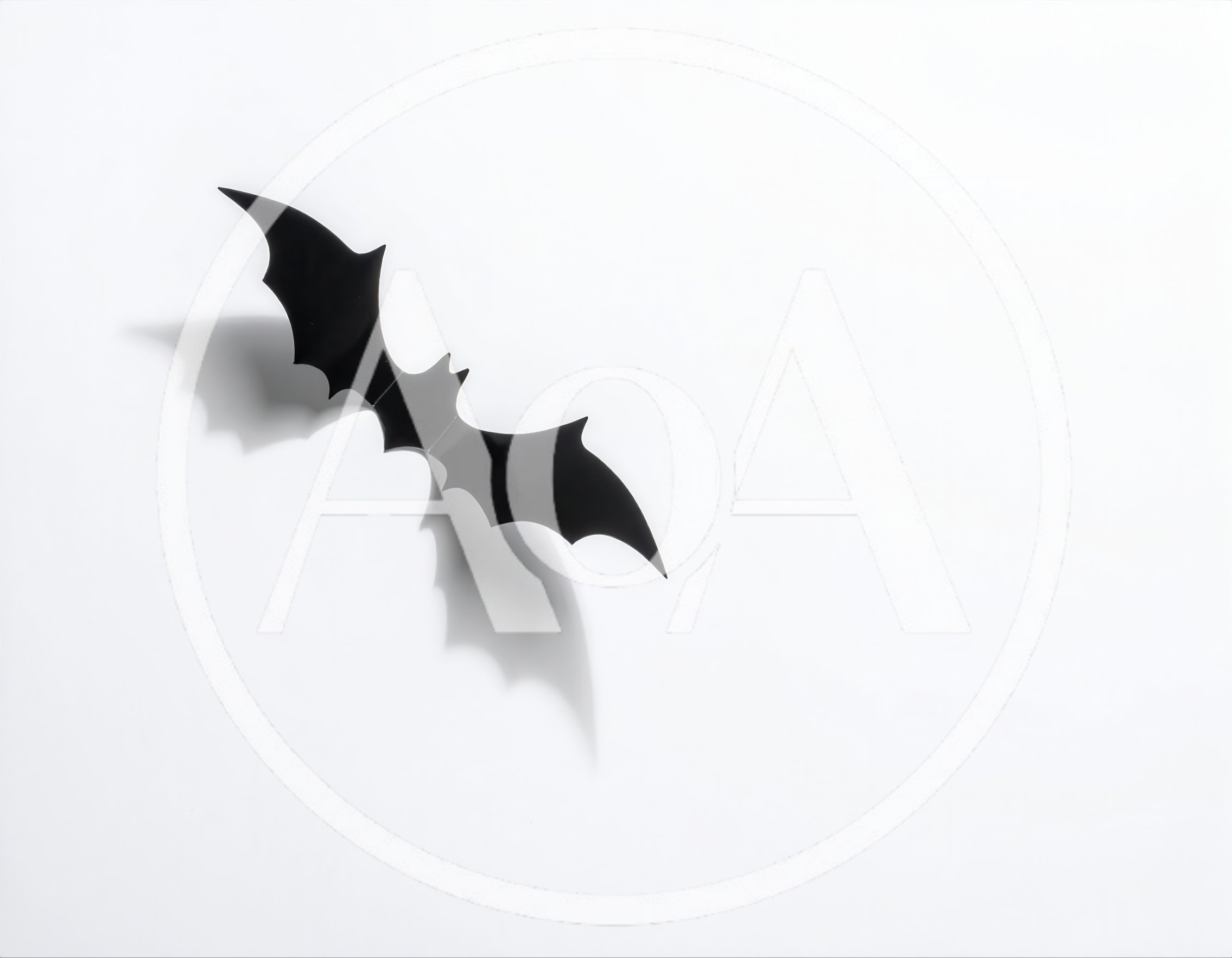 Black Paper Bat Decoration on White Background