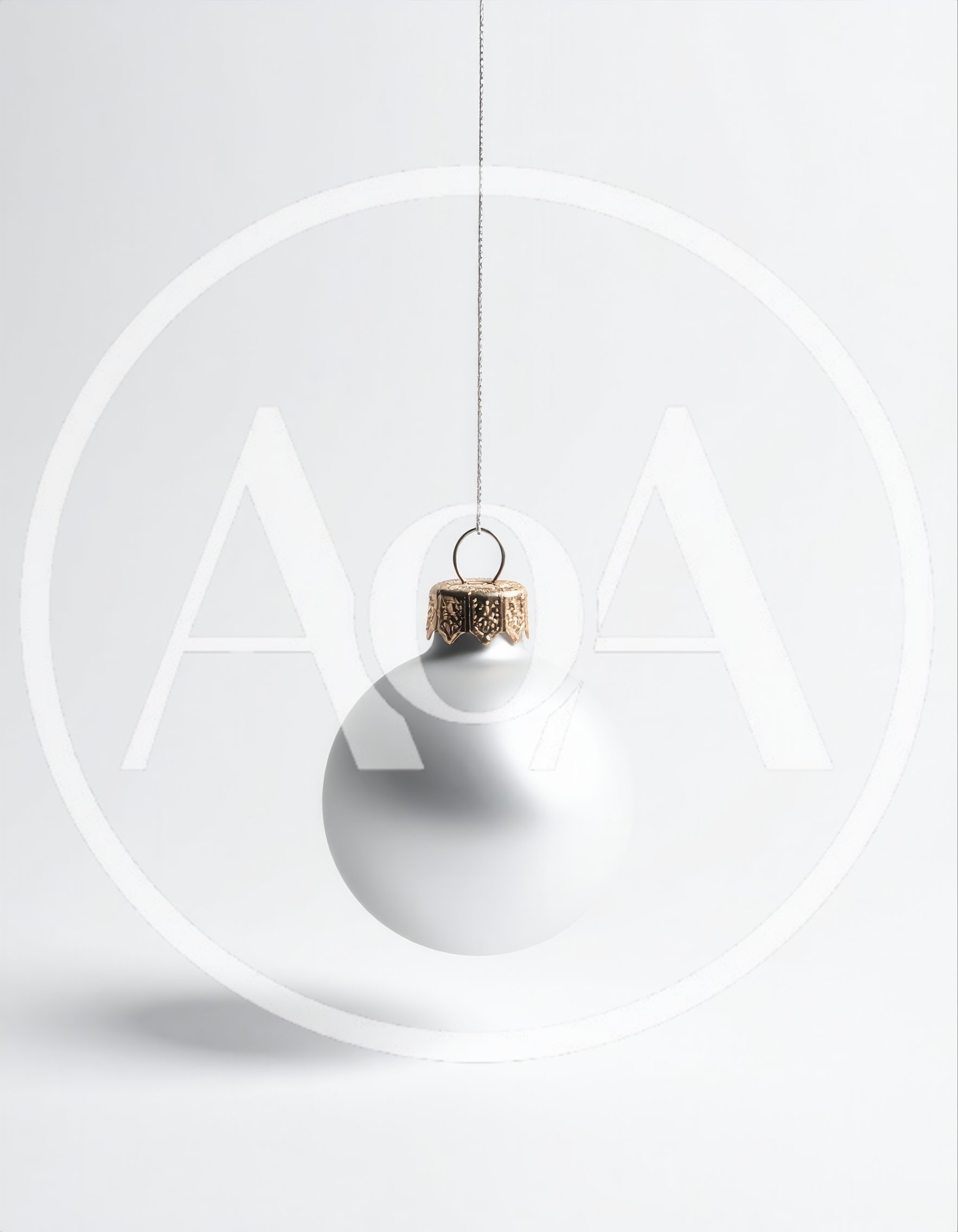 Silver Christmas Ornament Hanging Against White Background