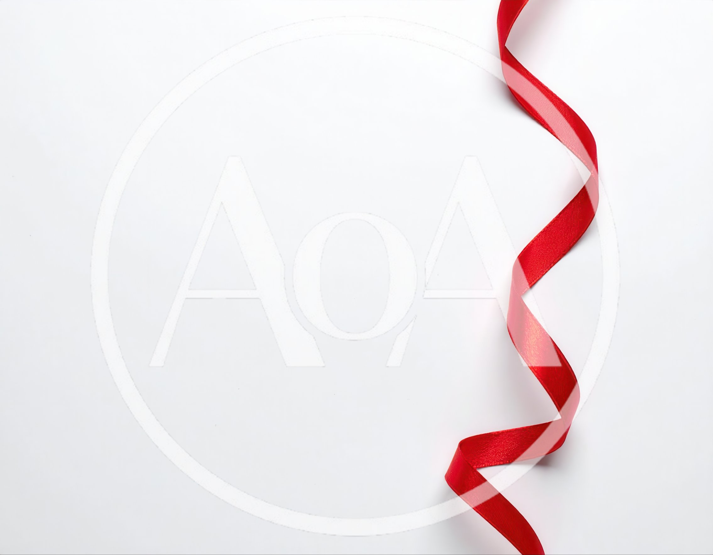 Red Satin Ribbon Curled On White Background