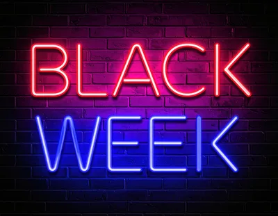 Neon Black Week Sign on Dark Brick Wall