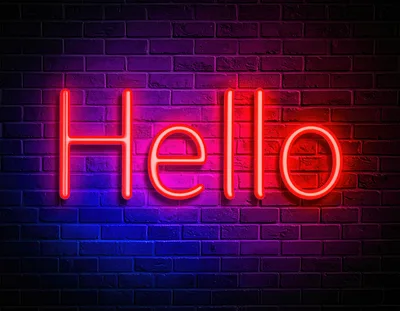 Neon Hello Sign On A Brick Wall