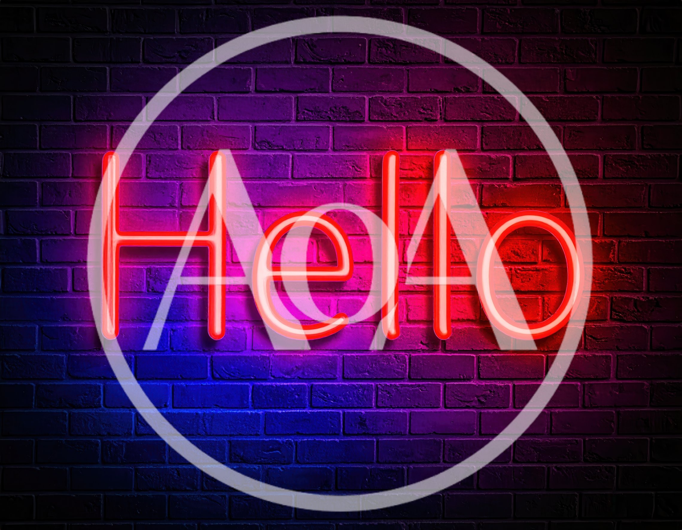 Neon Hello Sign On A Brick Wall