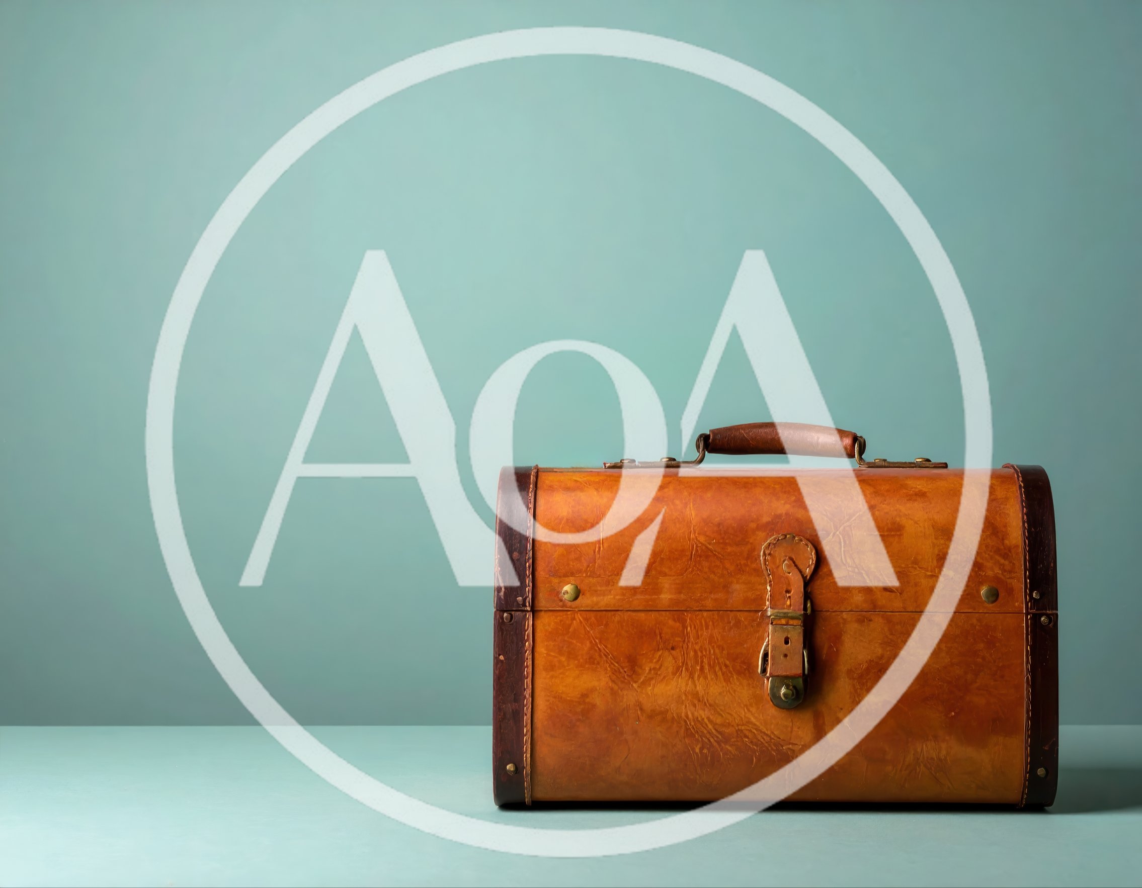 Vintage Leather Suitcase On A Teal Background